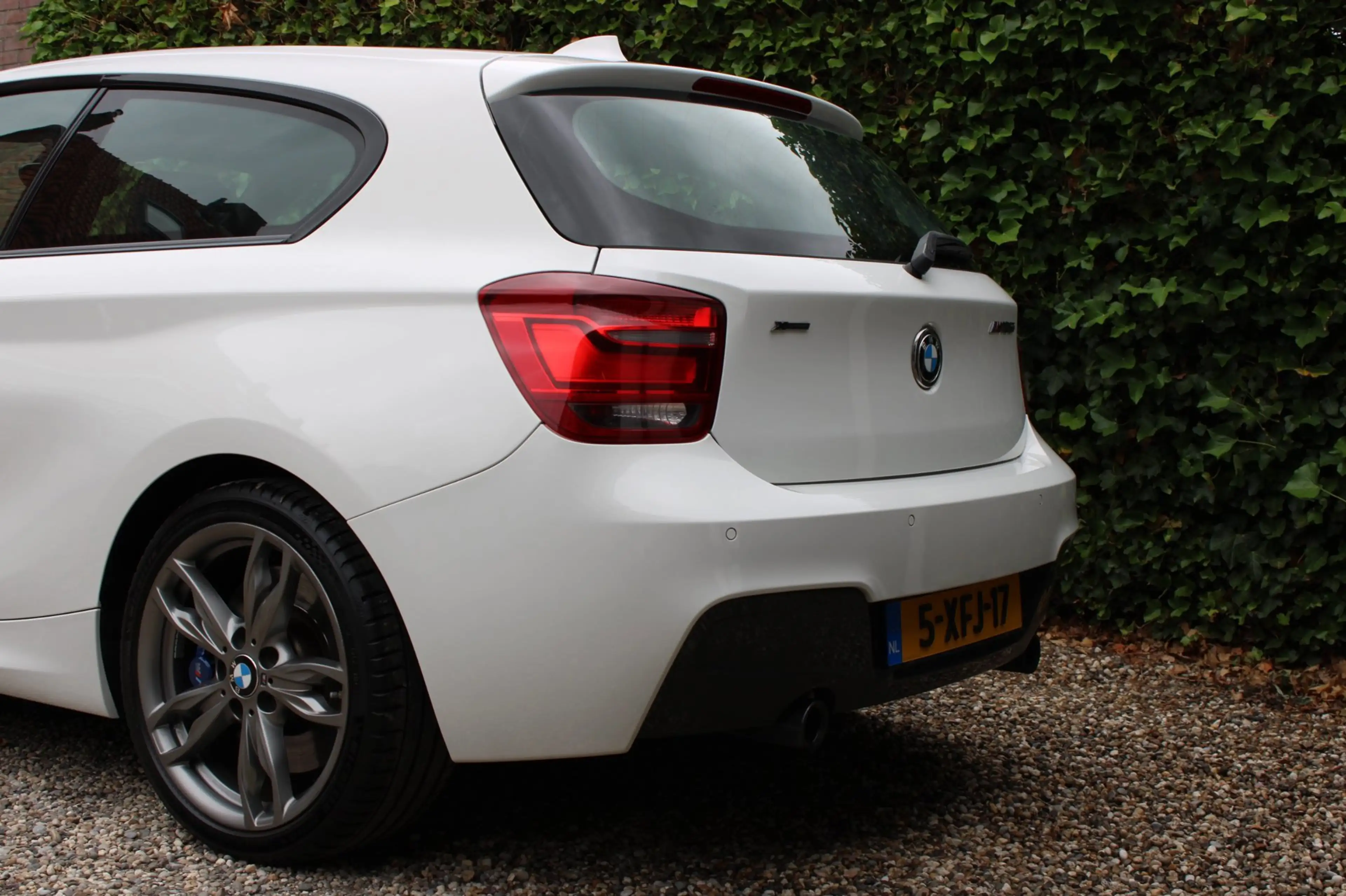 BMW 135 1-serie M135i xDrive High Executive — photo 24