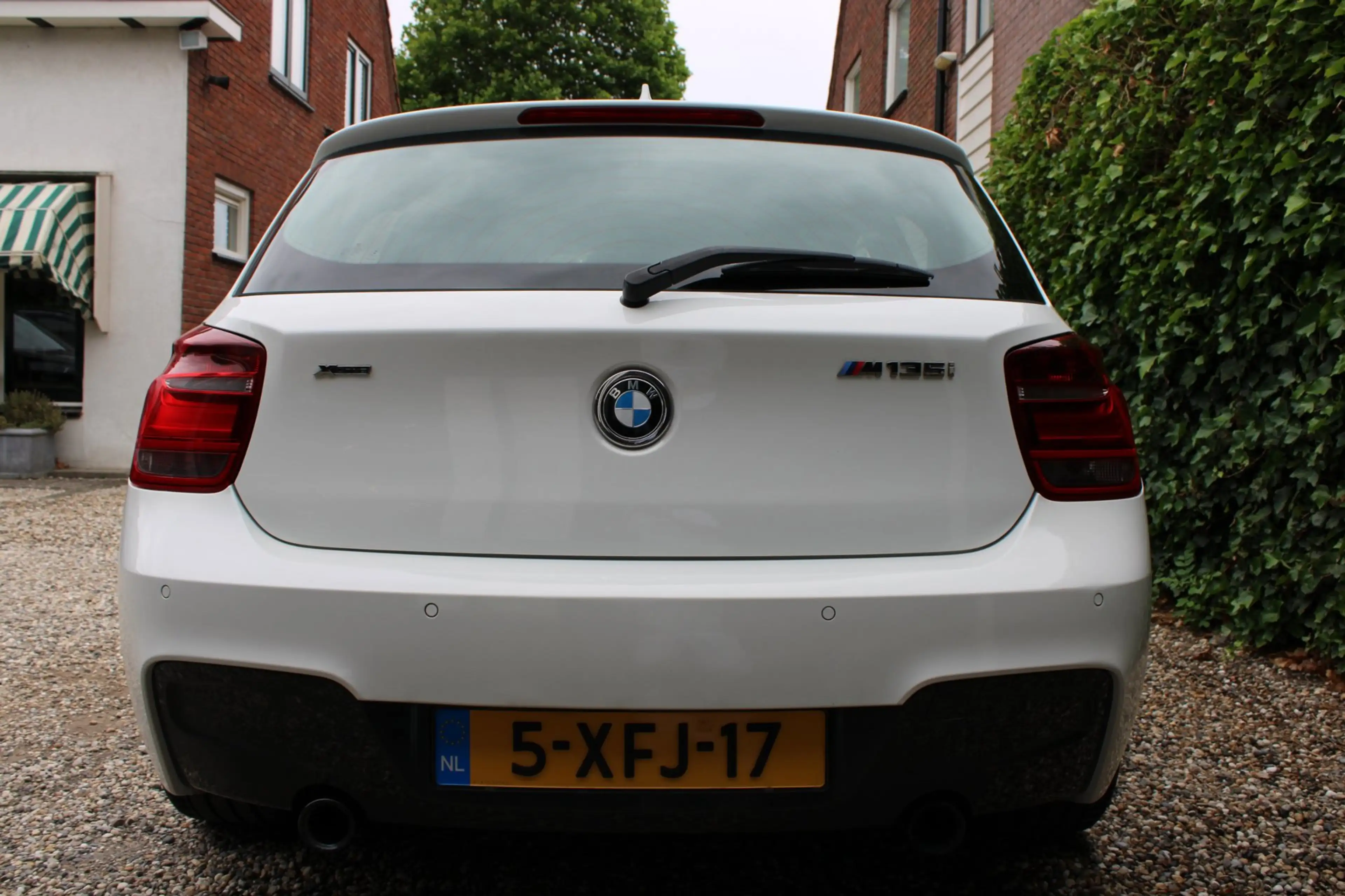 BMW 135 1-serie M135i xDrive High Executive — photo 31