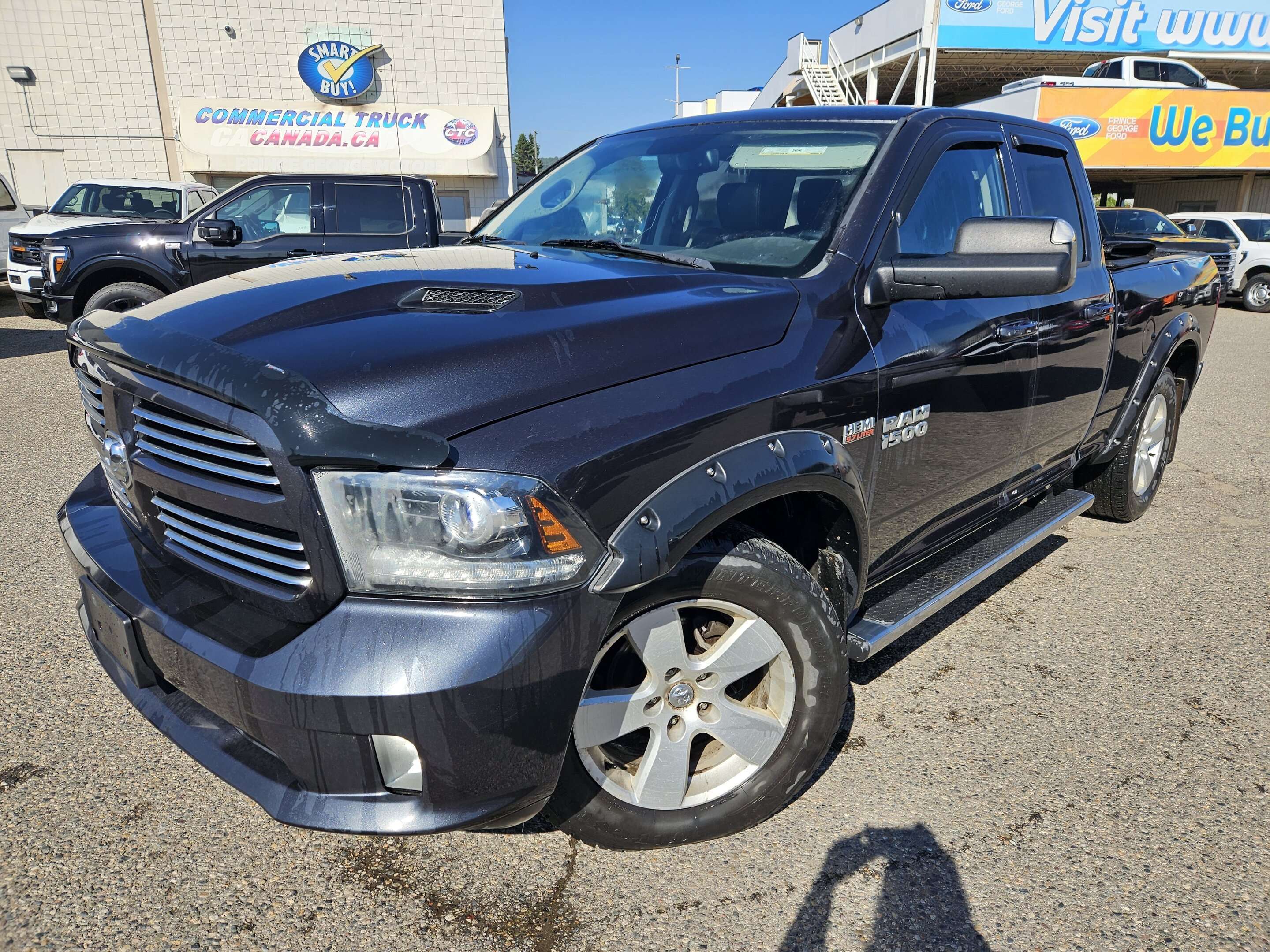 Gray 2015 RAM 1500 Pickup Truck Four-Wheel Drive 8-Speed Automatic