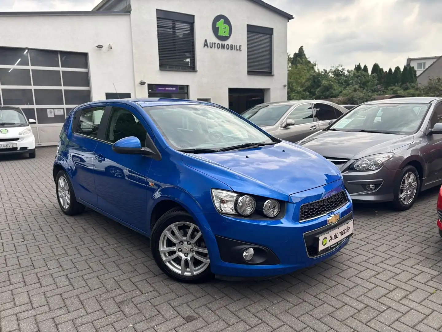 Chevrolet Aveo Schrägheck LTZ*PDC*TEMPO*KLIMA*SHZ Albastru - 1