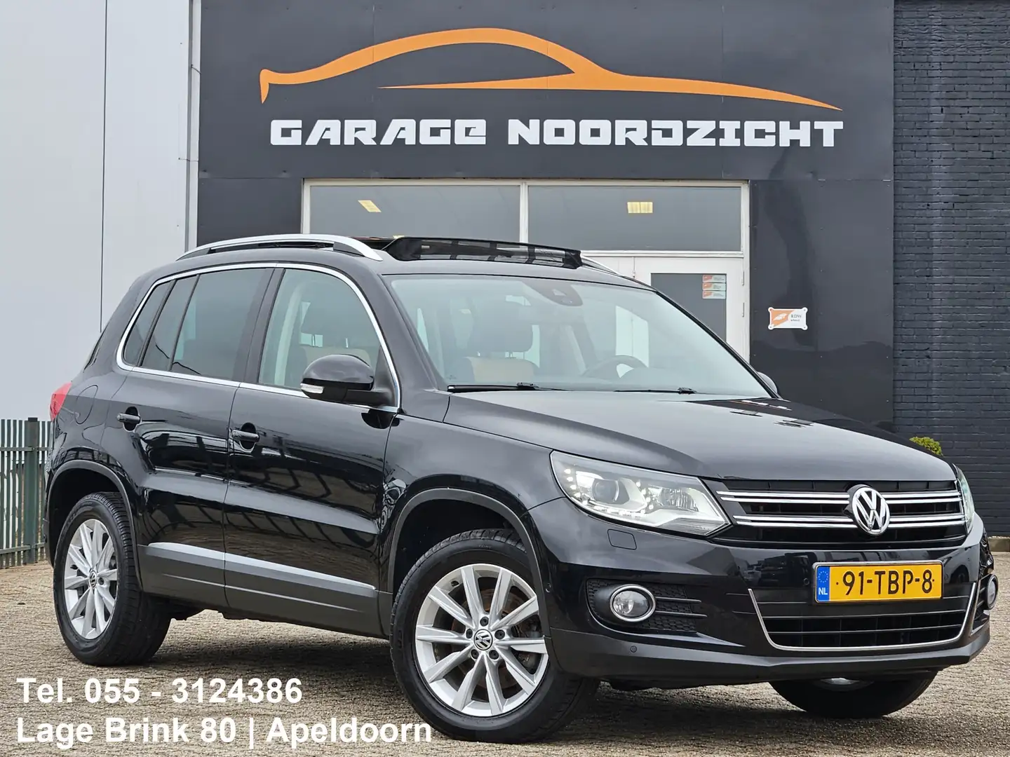 Volkswagen Tiguan 1.4 TSI 160PK Sport&Style PANORAMADAK|XENON LED|NA Zwart - 1