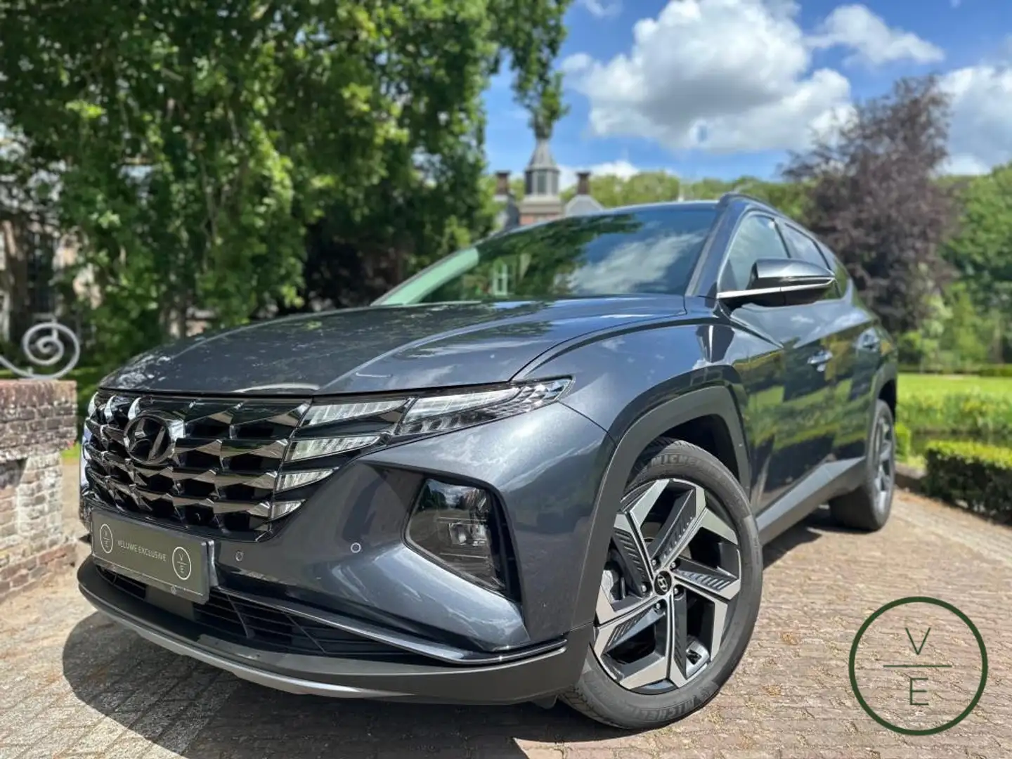 Hyundai TUCSON 1.6 T-GDI PHEV | Adaptive | Keyless | Dealer Onder Gris - 1