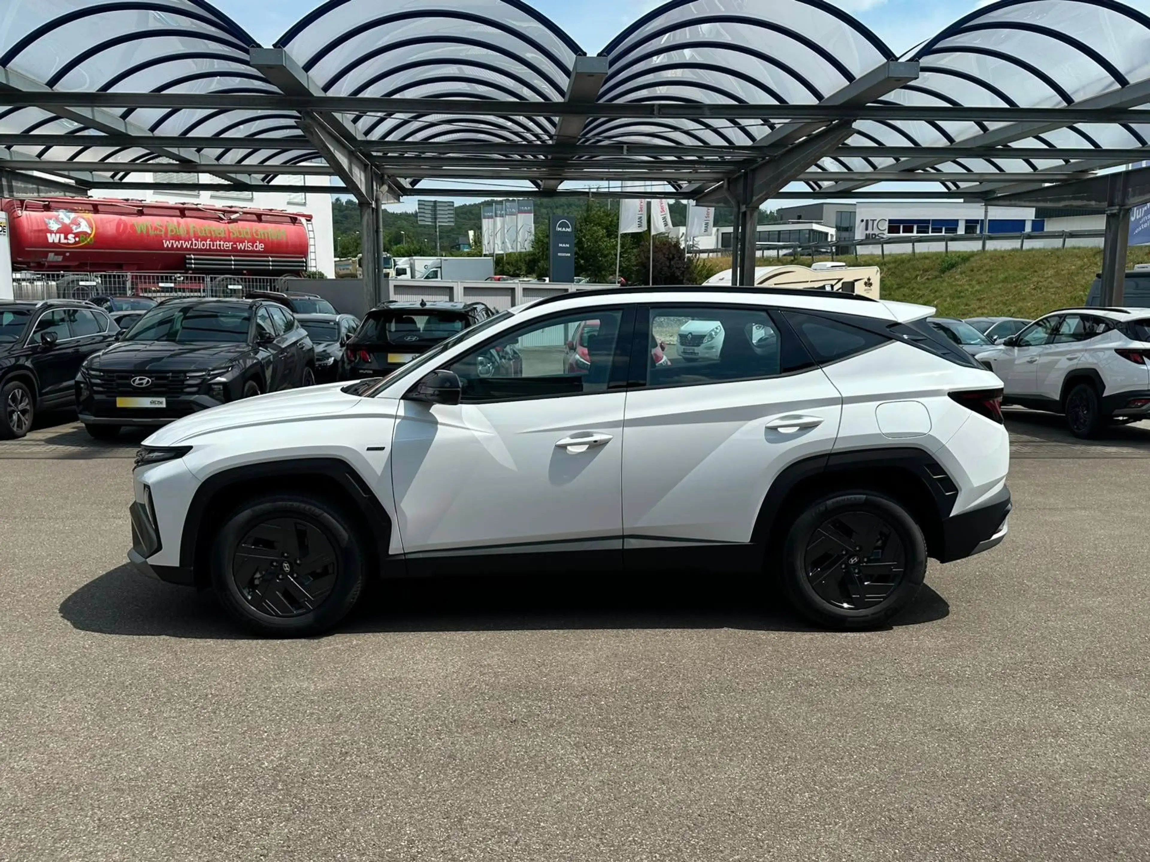 Hyundai TUCSON HYBRID 239 PS BLACK LINE NAVI LED SHZ KAM — photo 3