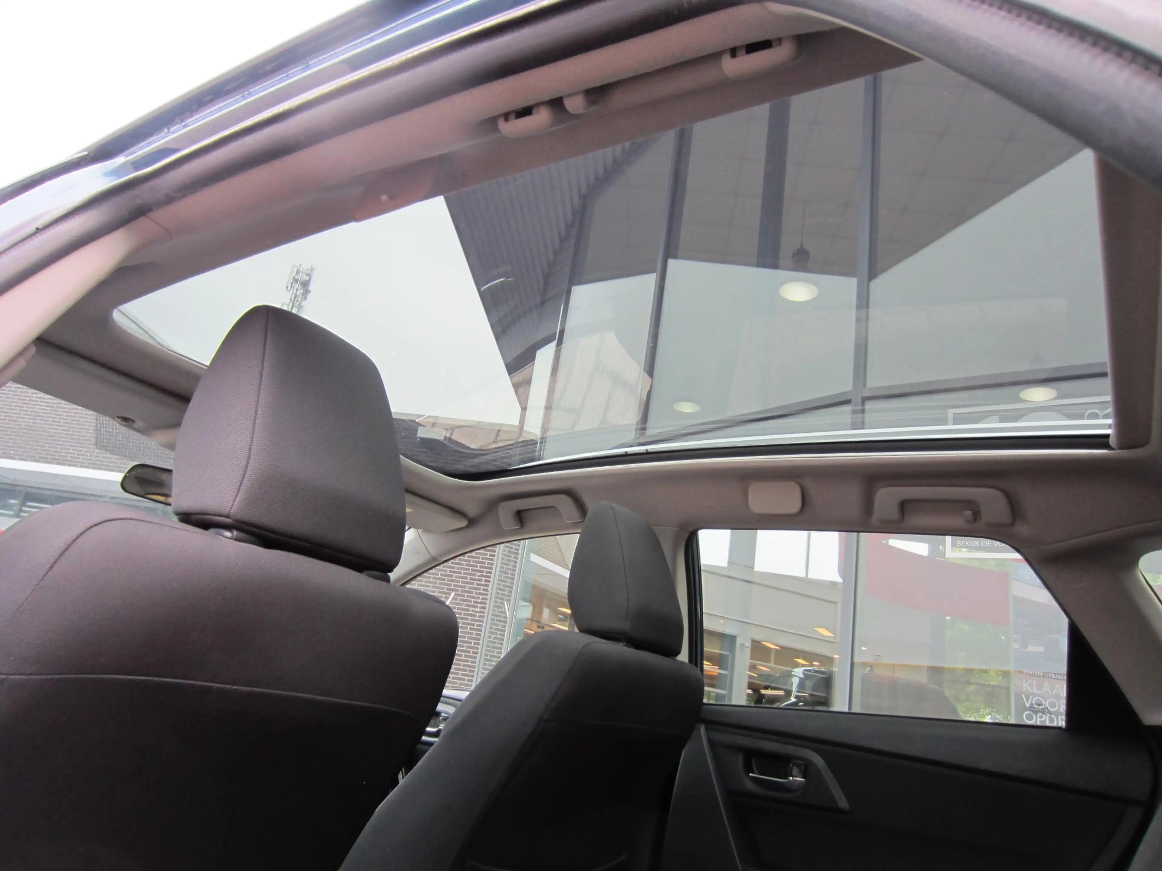Toyota Auris Touring Sports 1.8 Hybrid Dynamic Navi Panoramadak — photo 13