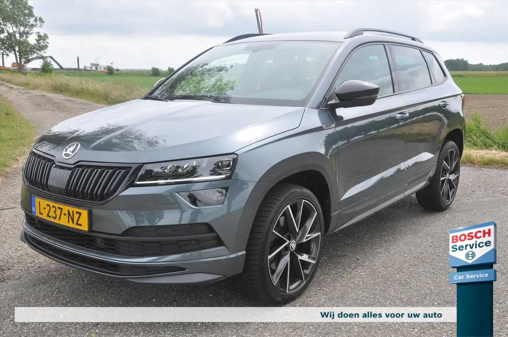 Skoda Karoq 1.5 TSI Sportline Automaat Grijs - 1