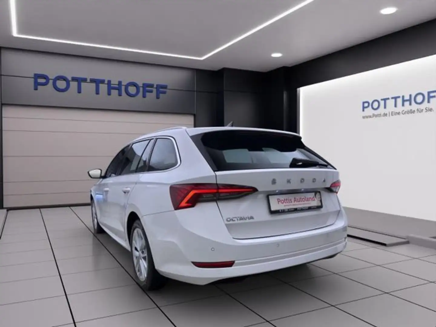 Skoda Octavia Combi 2.0 TDI DSG STYLE NAVI AHK SITZHZG Weiß - 2