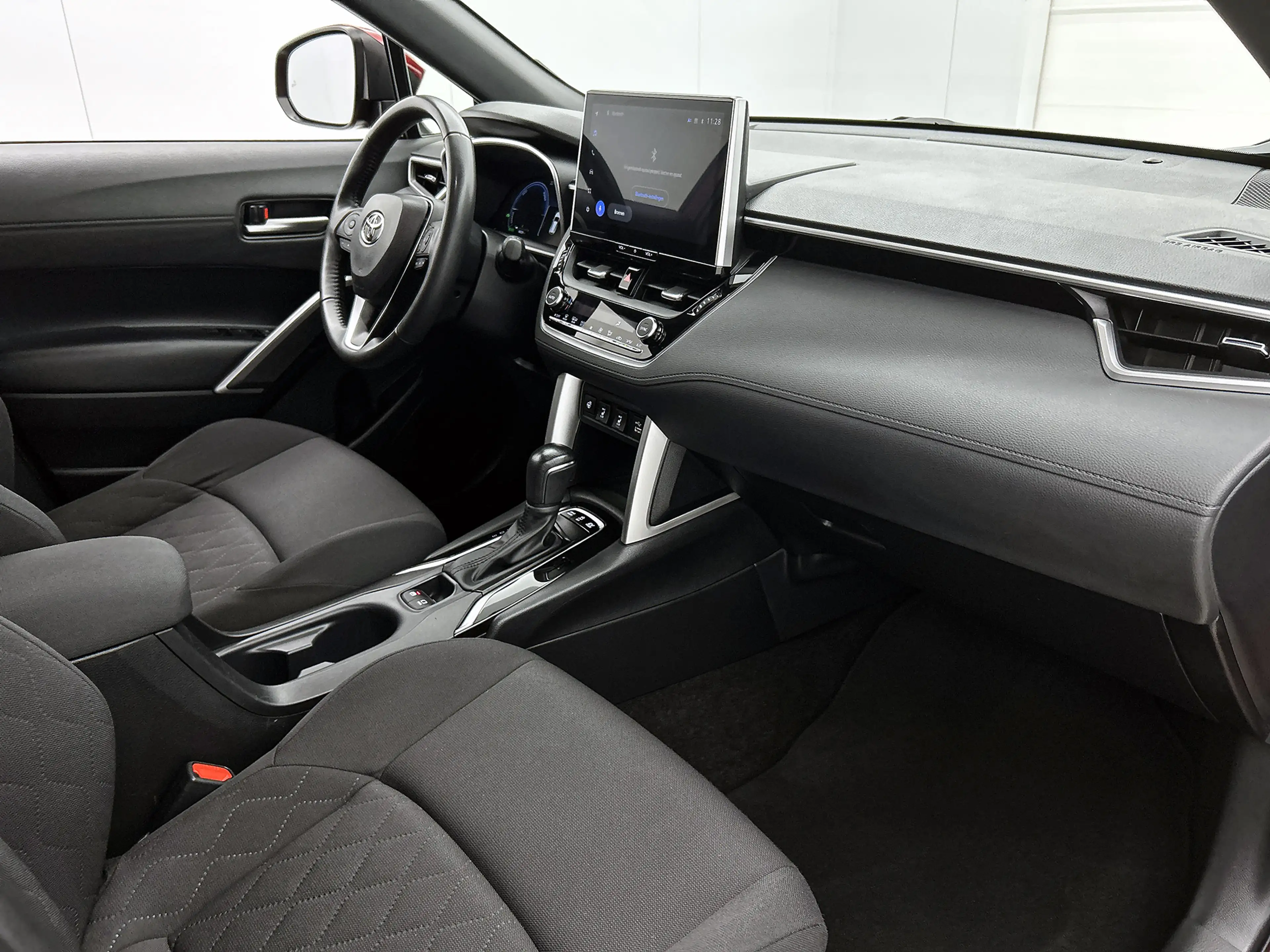 Toyota Corolla Cross 2.0 High Power Hybrid First Edition | Stoel en stu — photo 6