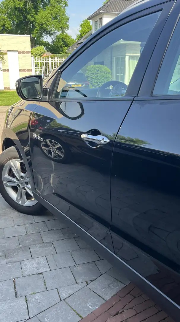 Hyundai iX35 1.6i GDI Style |< 100.000 km |1e eigenaar | Zwart - 1