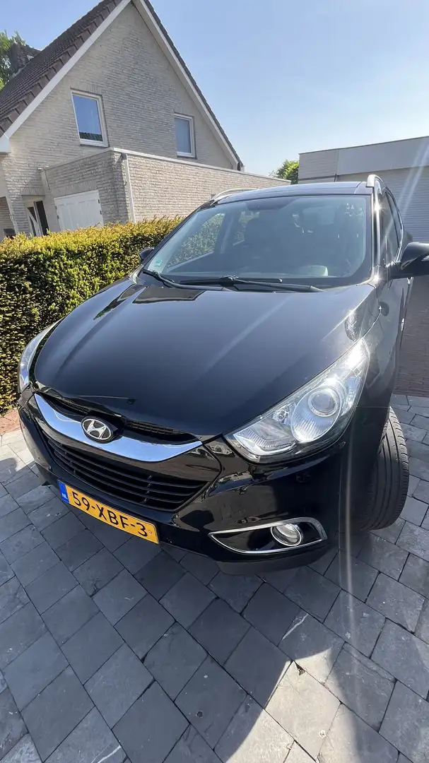 Hyundai iX35 1.6i GDI Style |< 100.000 km |1e eigenaar | Zwart - 2