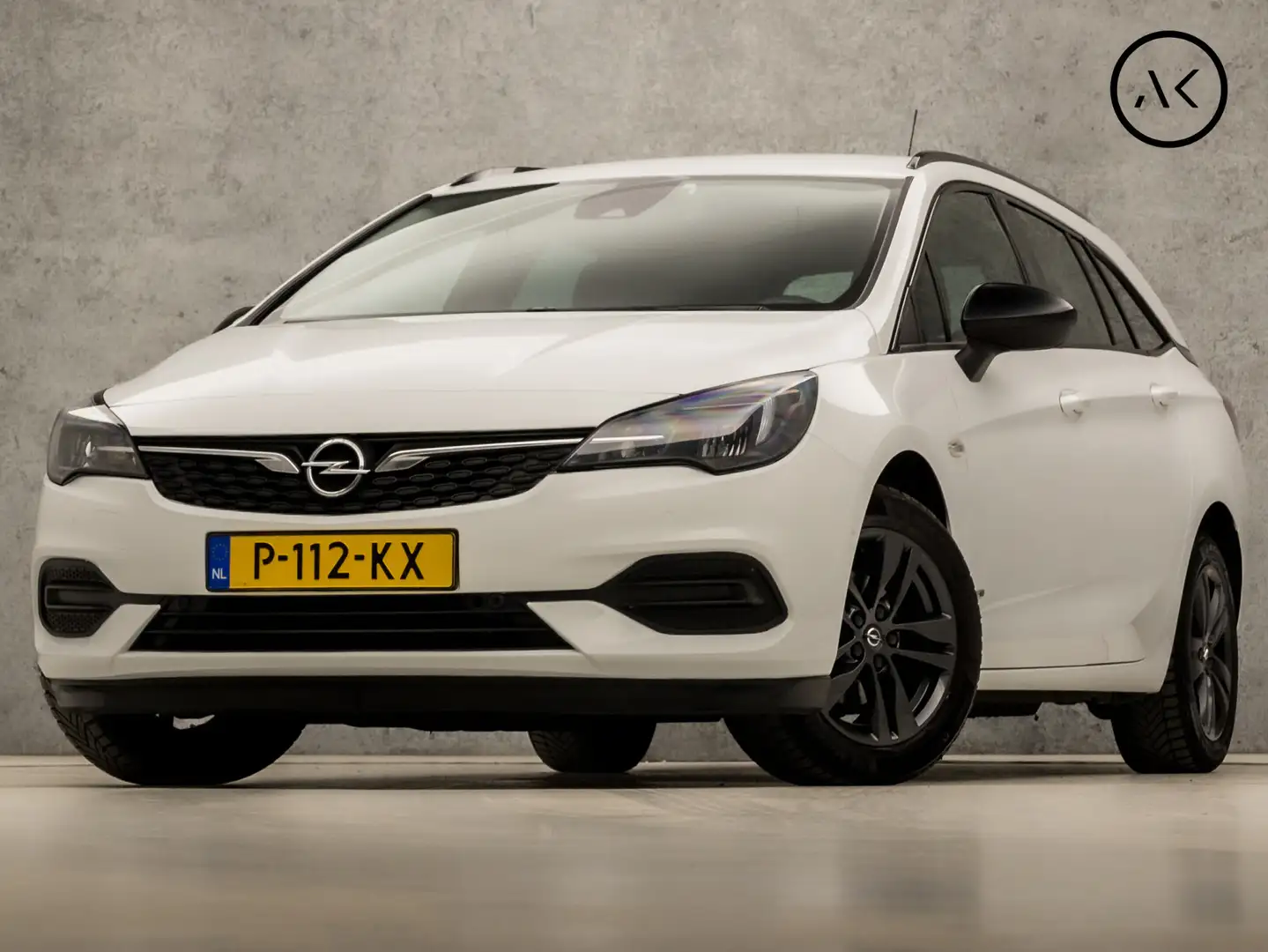 Opel Astra Sports Tourer 1.2 Sport (APPLE CARPLAY, NAVIGATIE, Wit - 1