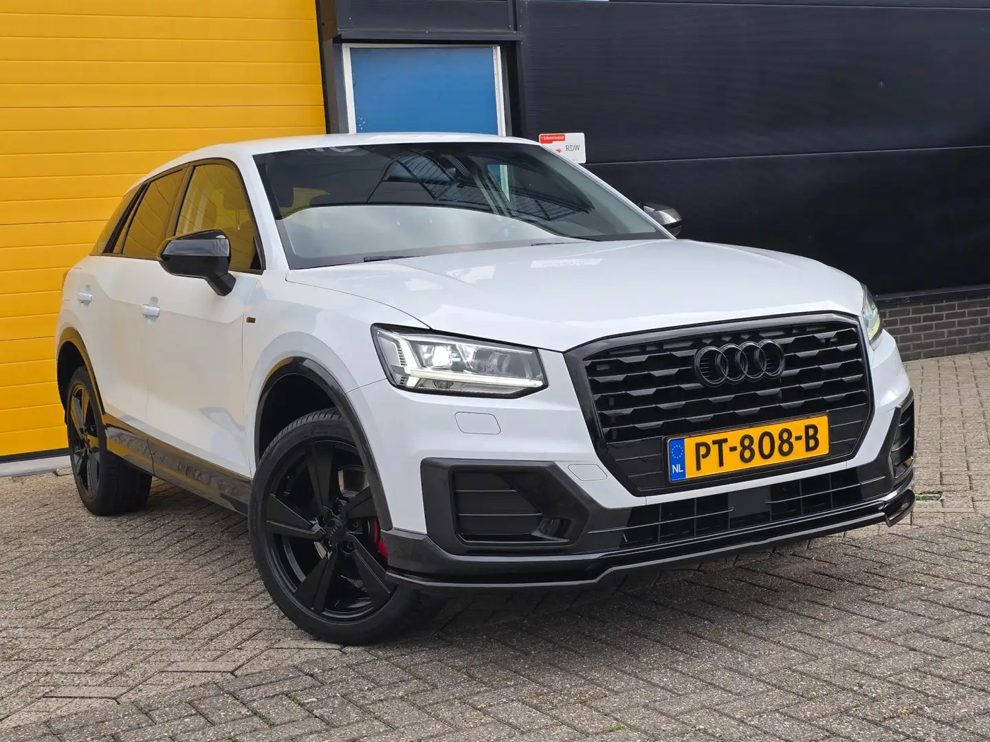 Audi Q2 1.0 TFSI S Line / AUT / NAP / Navi / Airco / Elek Blanc - 1