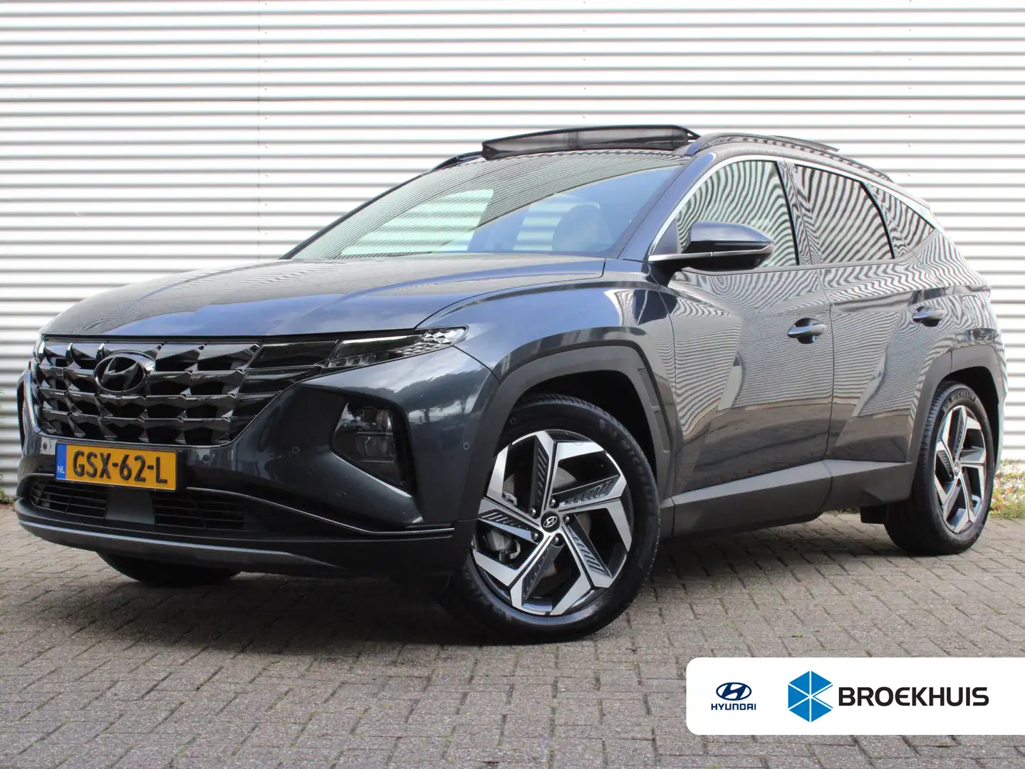 Hyundai TUCSON 1.6 T-GDI PHEV Premium Sky 4WD | Afneembare Trekha Grau - 1