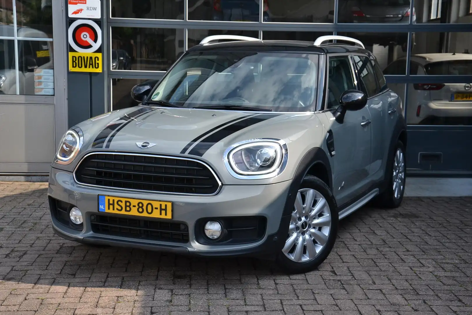 MINI Cooper Countryman 1.5 136pk ALL4 Aut. Grijs - 1