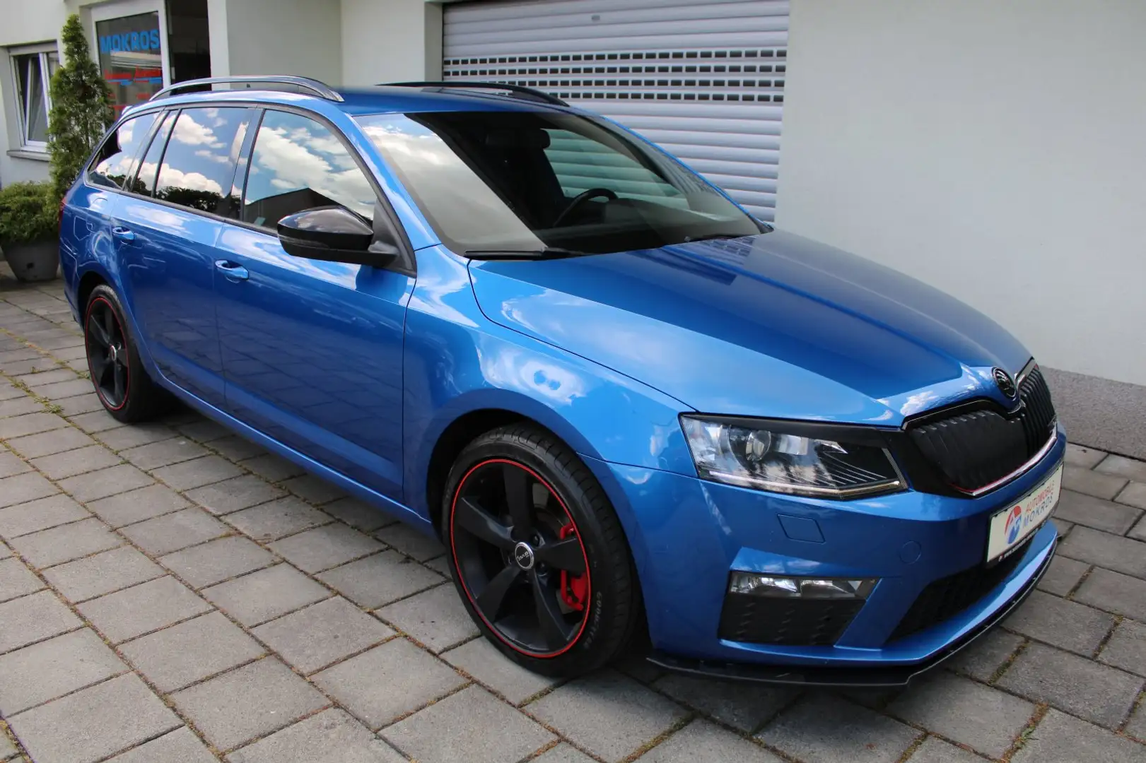 Skoda Octavia Combi 2.0 TDI RS BiXenon Leder Navigation Tempomat Blauw - 1