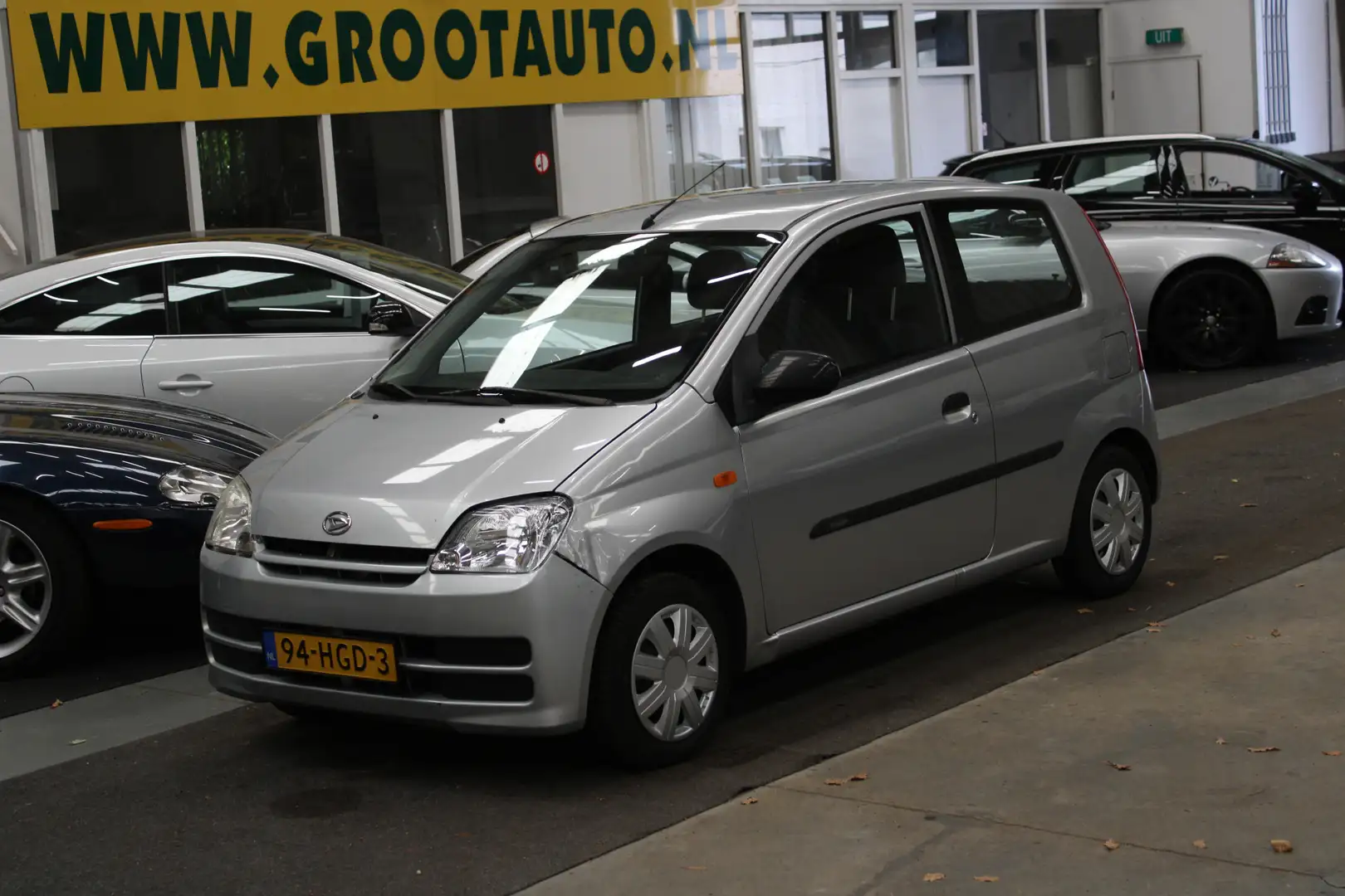 Daihatsu Cuore 1.0-12V 100th Anniversary Stuurbekrachtiging Gris - 1