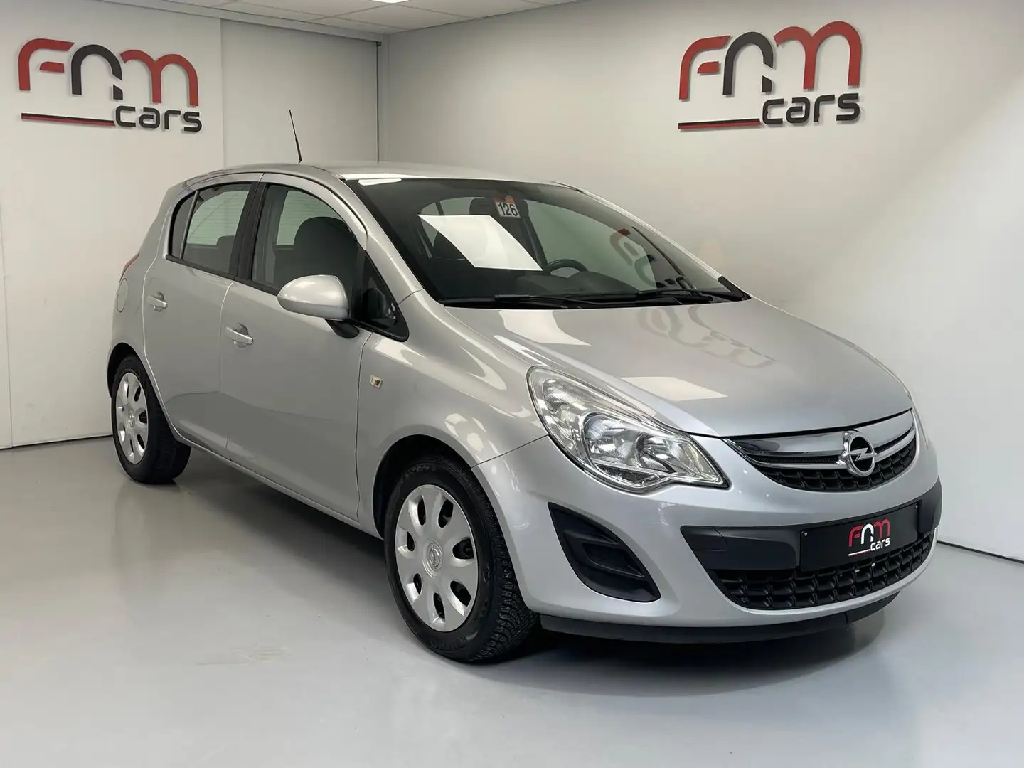 Opel Corsa 1.2i benzine bwj2013 Airco Cruise Garantie Argent - 1