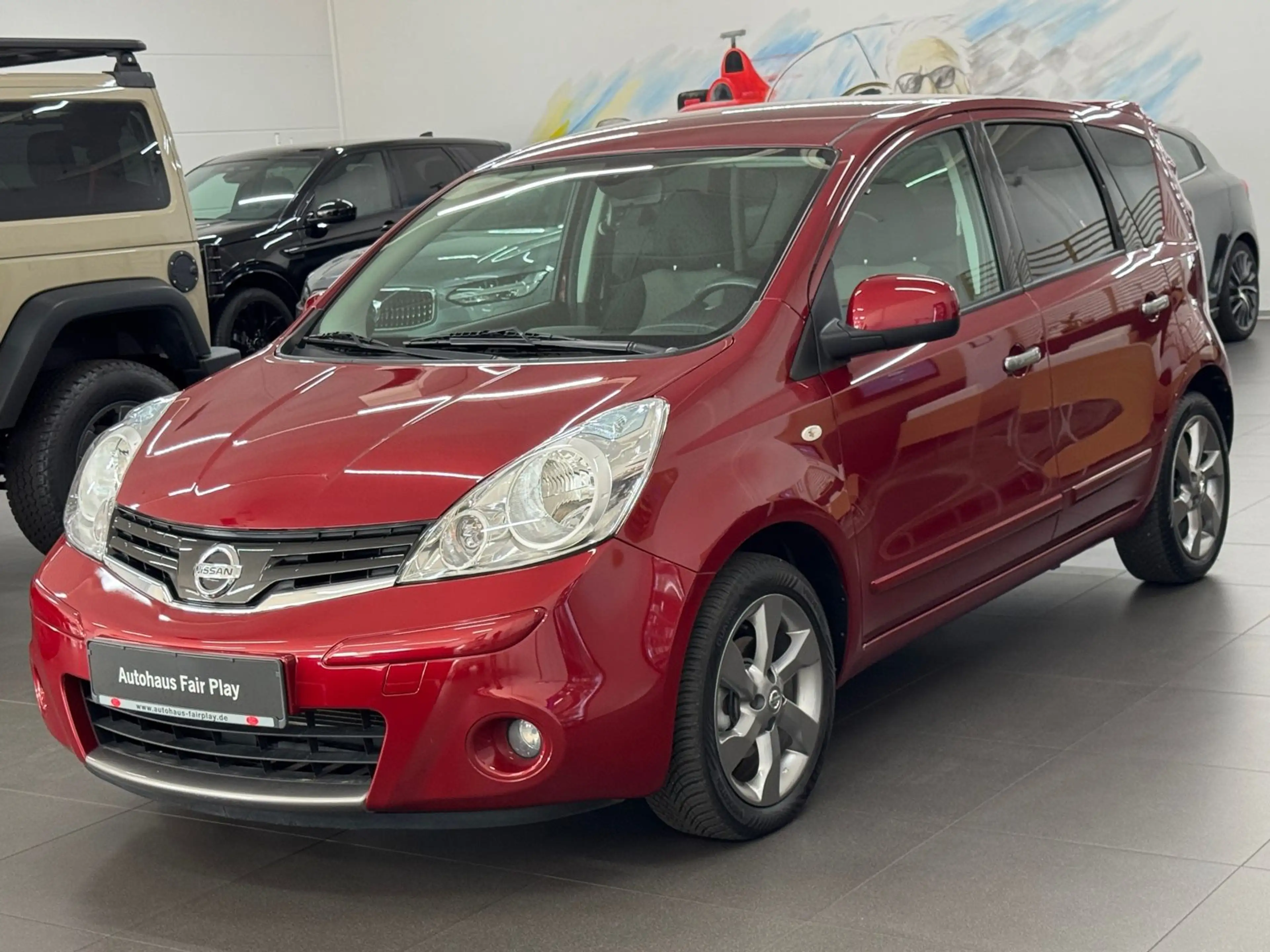 Nissan Note 1.6 Aut. PDC/NAVI/UNFALLFREI/1.HAND/TOP!