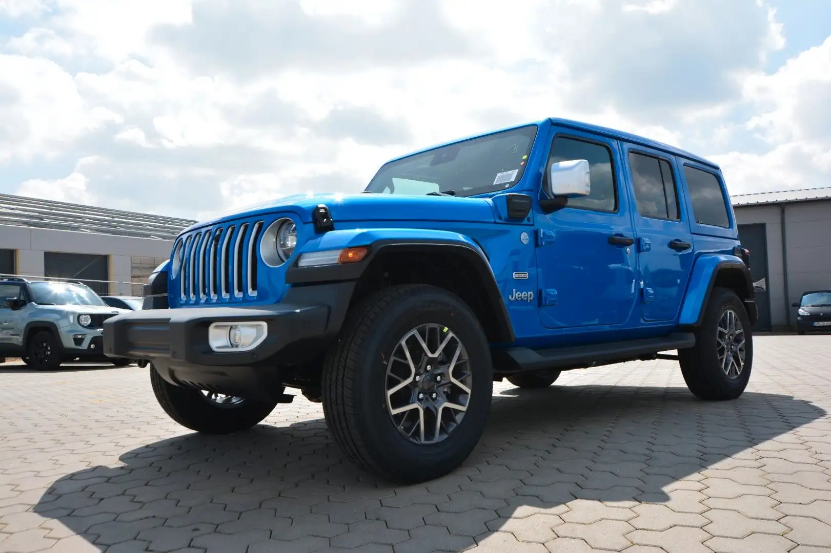 Jeep Wrangler Unlimited Sahara PHEV Sky One-Touch Синій - 1