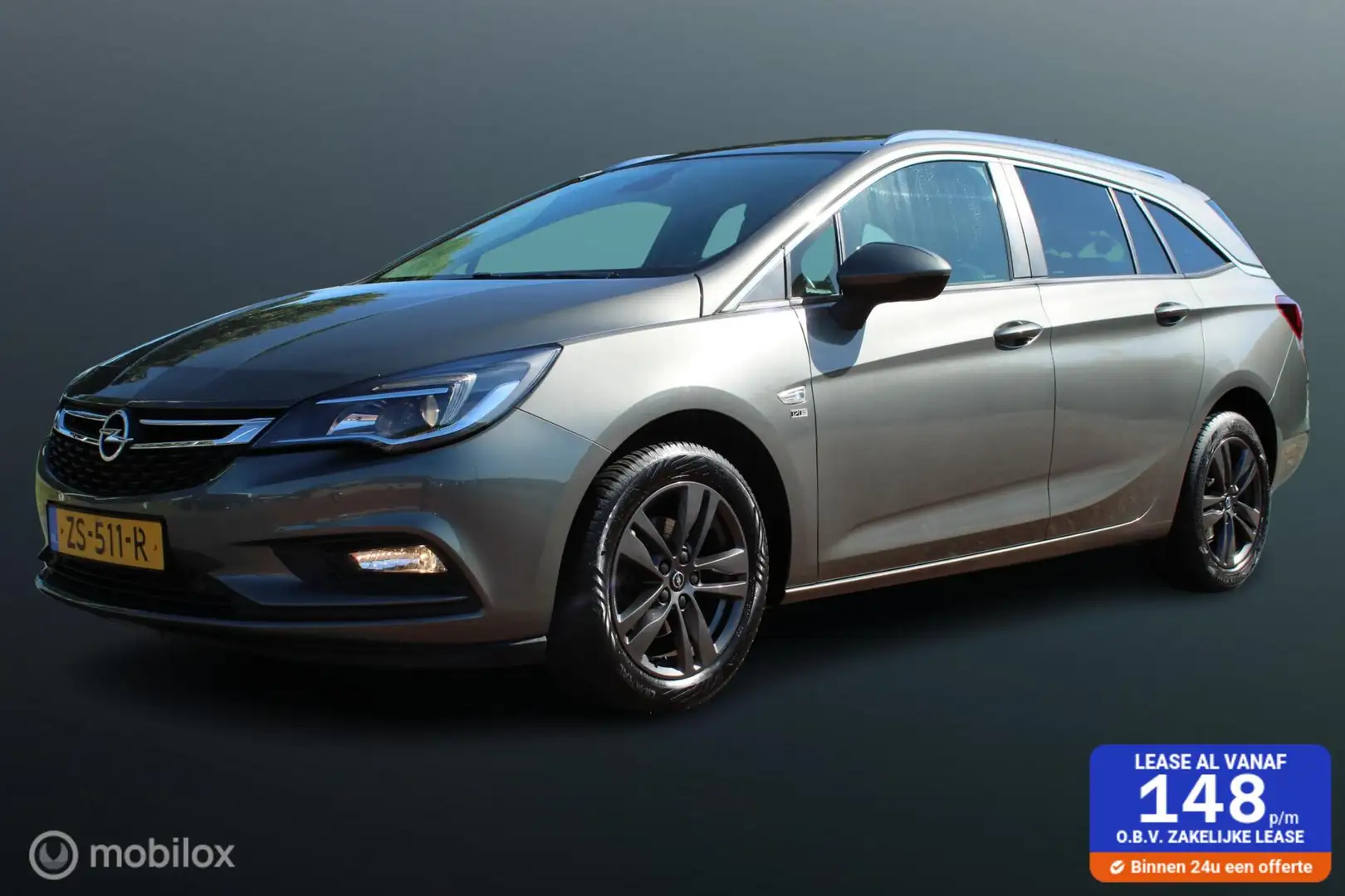 Opel Astra Sports Tourer 1.0 Turbo 120 Jaar Edition, Pdc Voor Grijs - 1