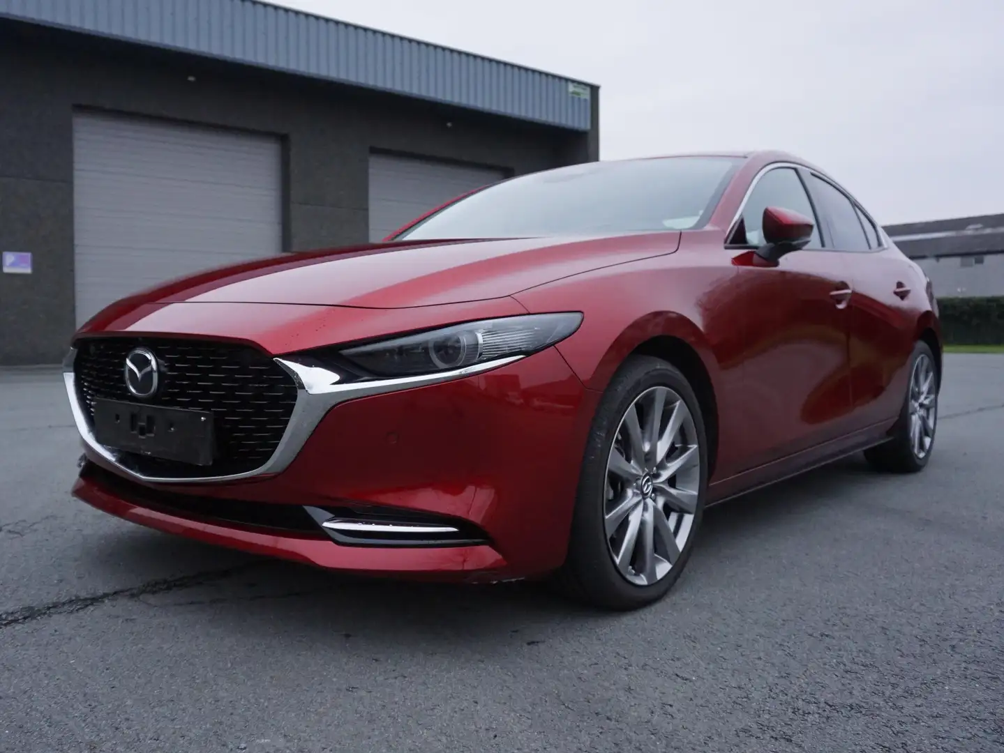 Mazda 3 e-SKYACTIV-X 186Pk M HYBRID Eclusive Als  Nieuw Rouge - 1