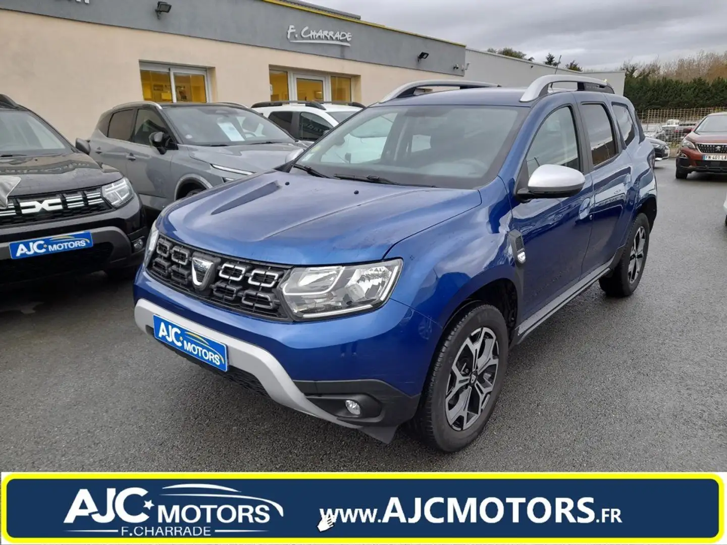 Dacia Duster 1.5 BLUE DCI 115CH PRESTIGE 4X2 E6U Bleu - 1