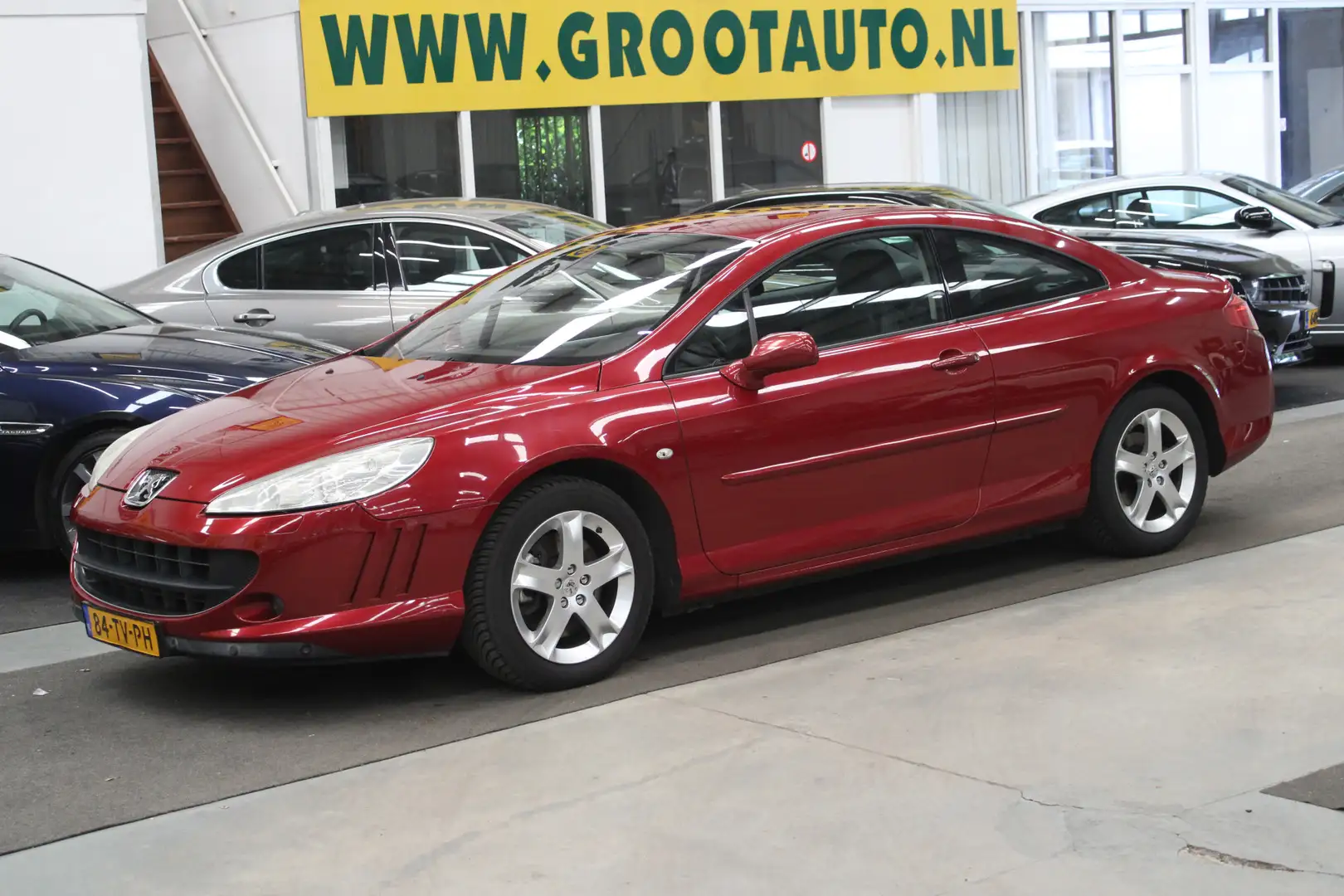 Peugeot 407 Coupé 2.2-16V Pack 135.667km NAP, Airco, Leder, Cr Piros - 1
