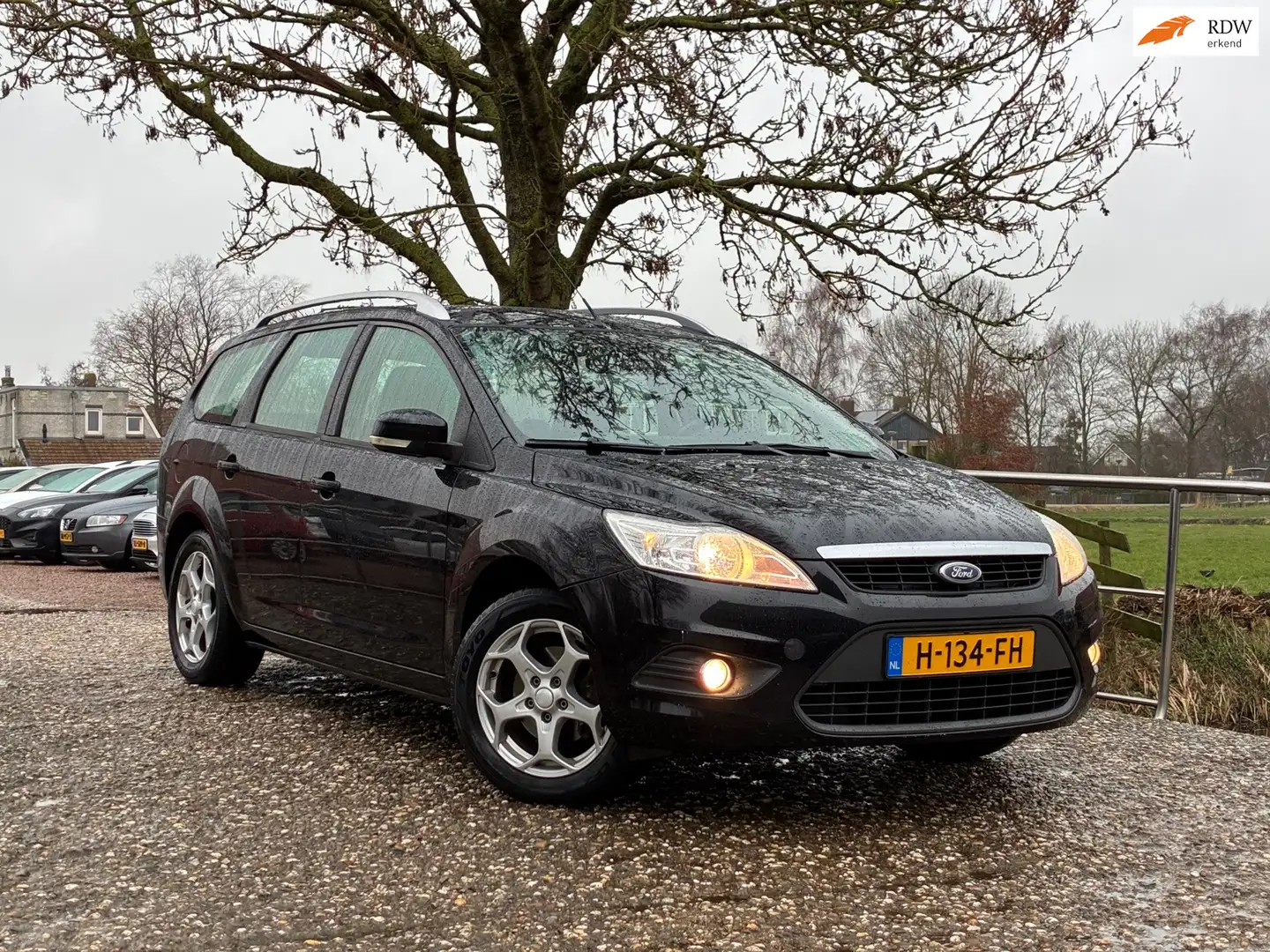 Ford Focus Wagon 1.6 Comfort | PDC + Cruise + Clima nu € 3.97 Schwarz - 1