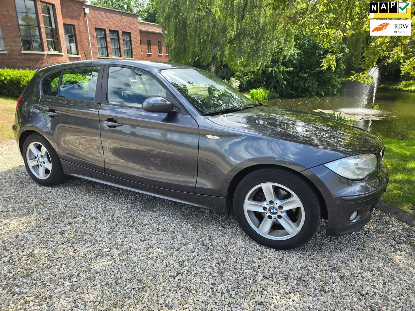 BMW 118 1-serie 118i High Executive Automaat Airco cruise Grey - 1