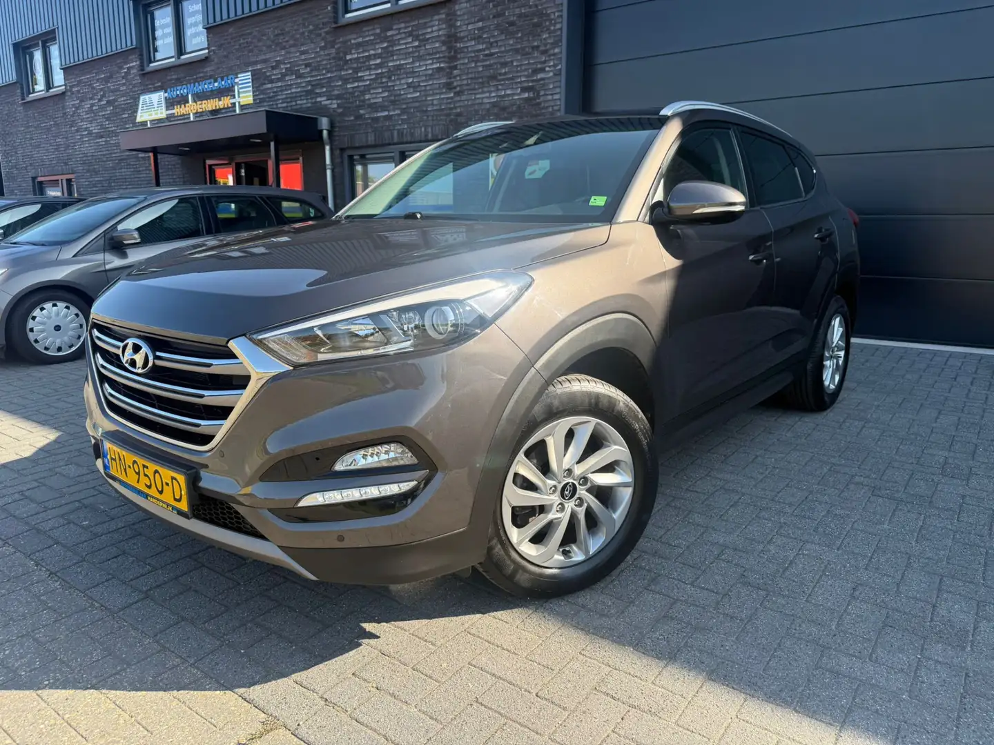 Hyundai TUCSON 1.6 GDi Comfort | 1E EIGENAAR | 12MND GARANTIE | A Brun - 1
