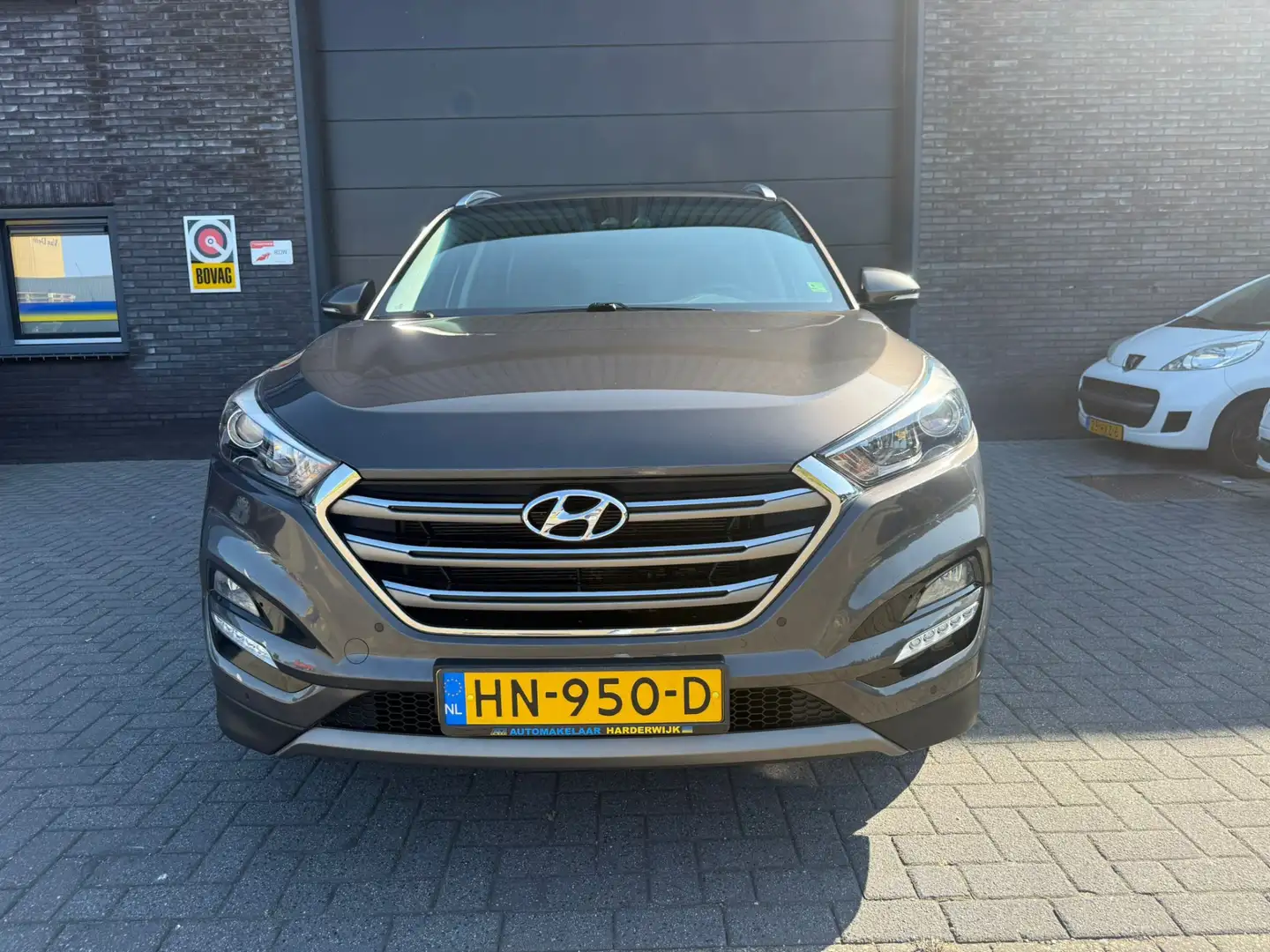 Hyundai TUCSON 1.6 GDi Comfort | 1E EIGENAAR | 12MND GARANTIE | A Brun - 2