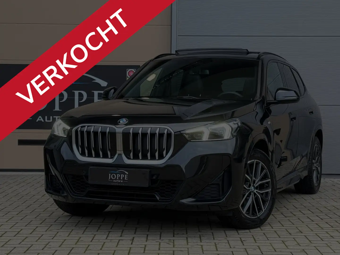 BMW X1 18i sDrive |M Sport|Pano|Leer|Elk.Trekhaak| Schwarz - 1