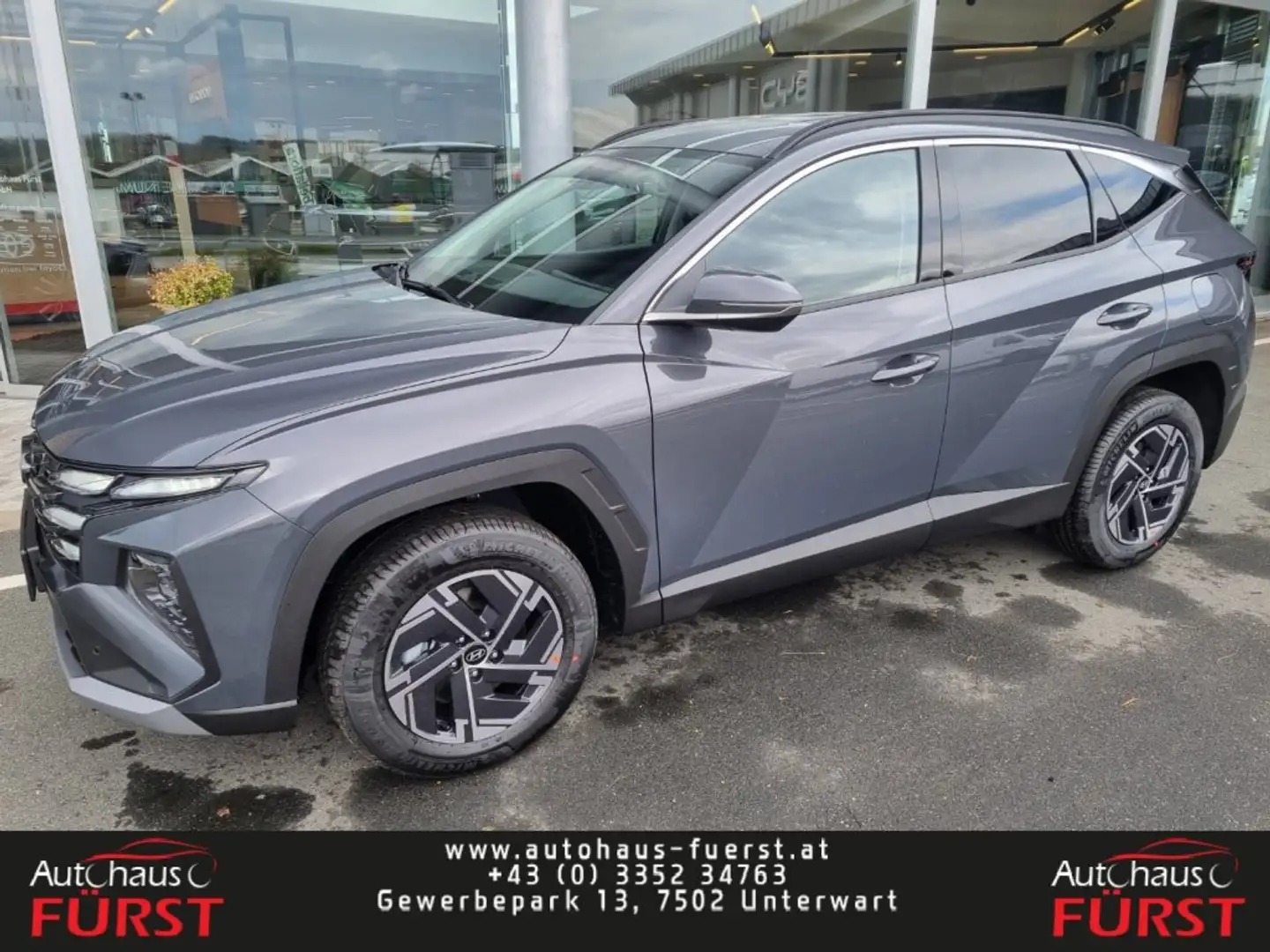 Hyundai TUCSON NX4 Jubile 1,6 T-GDi HEV 2WD AT t6hj1 Grau - 1