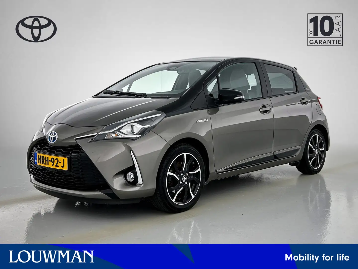 Toyota Yaris 1.5 Hybrid Bi-Tone Limited | Stoelverwarming | Nav Grijs - 1