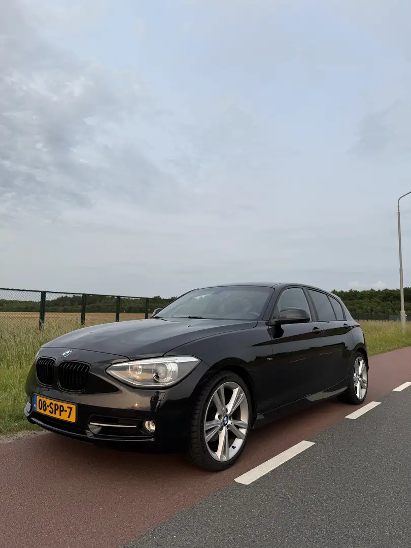 BMW 118 Business | Harmon Kardon | Navi | Carplay | Bi-xen Zwart - 1