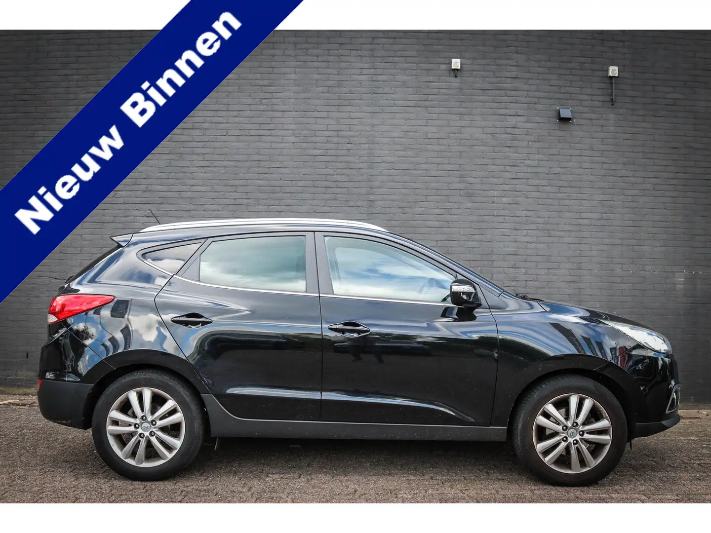 Hyundai iX35 2.0i i-Catcher Net binnen; Jouw droomauto? Zwart - 1