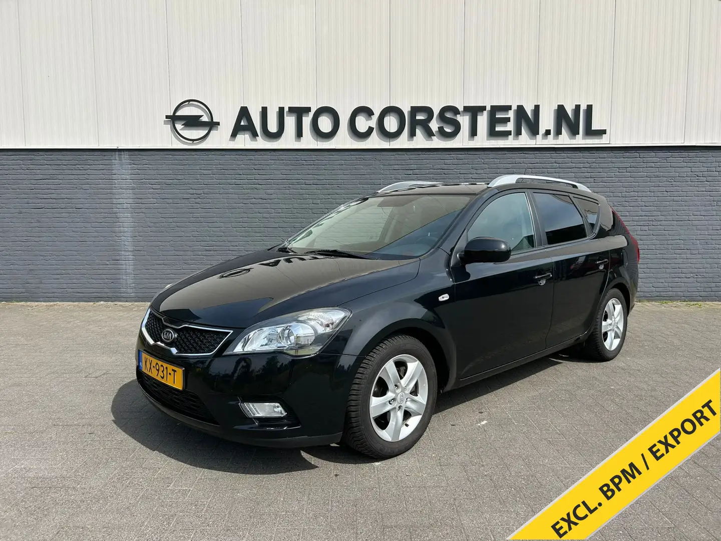 Kia Ceed / cee'd Sporty Wagon 1.4 CVVT X-tra Navi Ecc Cruise Contro Zwart - 1