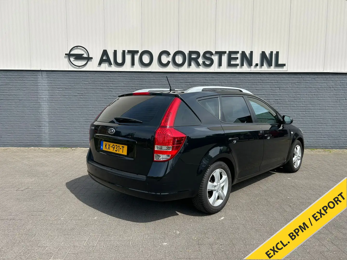 Kia Ceed / cee'd Sporty Wagon 1.4 CVVT X-tra Navi Ecc Cruise Contro Zwart - 2