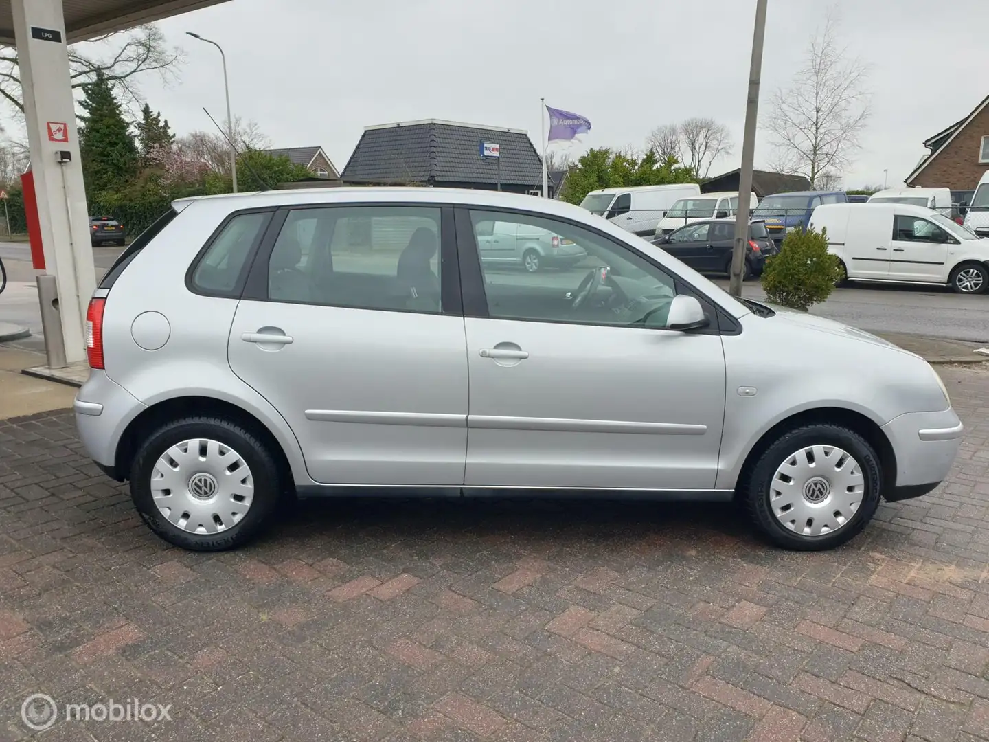 Volkswagen Polo 1.4-16V Highline Grijs - 2