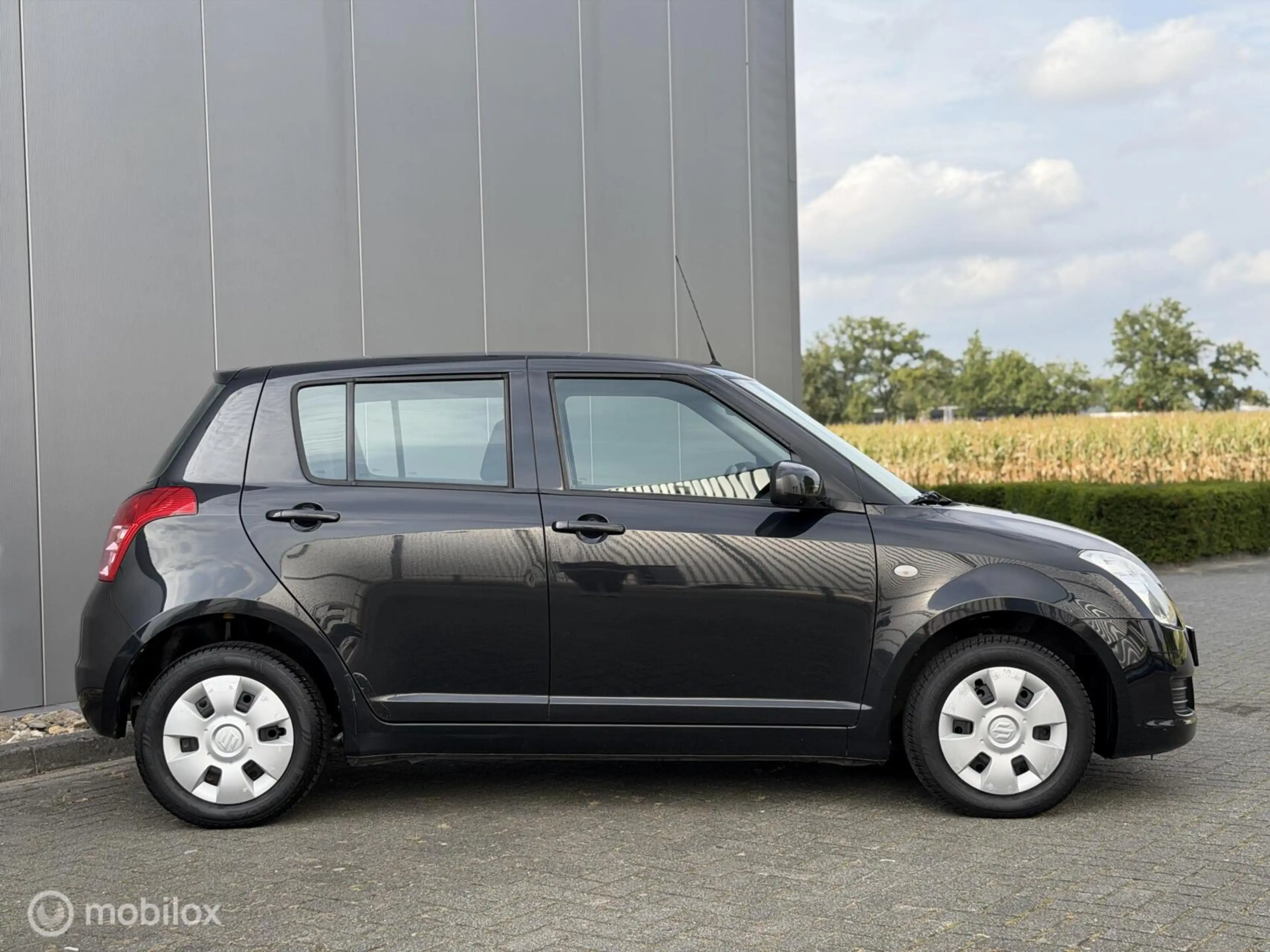 Suzuki Swift 1.3 Bandit|1E EIG|VOL OH|AIRCO|TOPSTAAT — photo 6