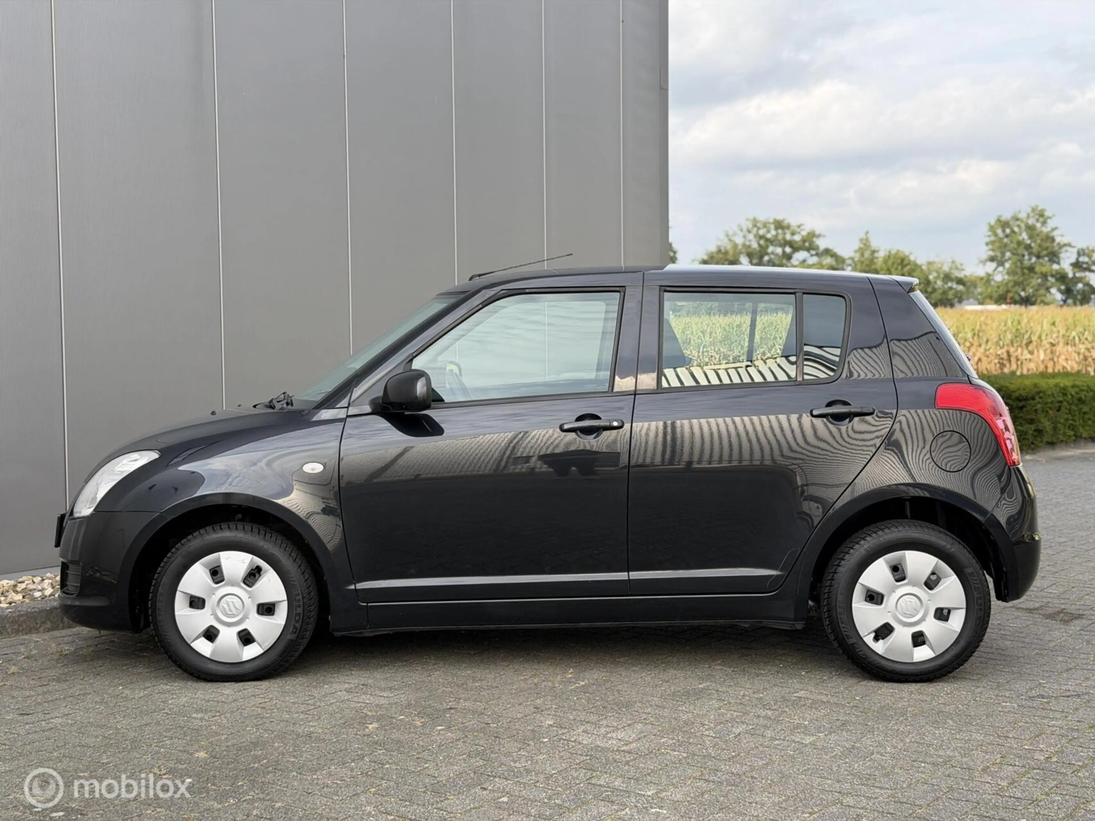 Suzuki Swift 1.3 Bandit|1E EIG|VOL OH|AIRCO|TOPSTAAT — photo 9