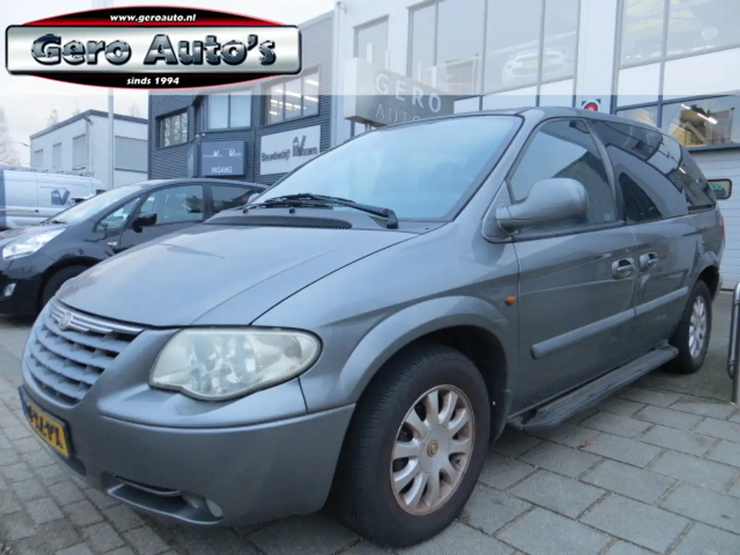 Chrysler Voyager 3.3i V6 SE automaat 7 persoons evt export ,airco e Gris - 1