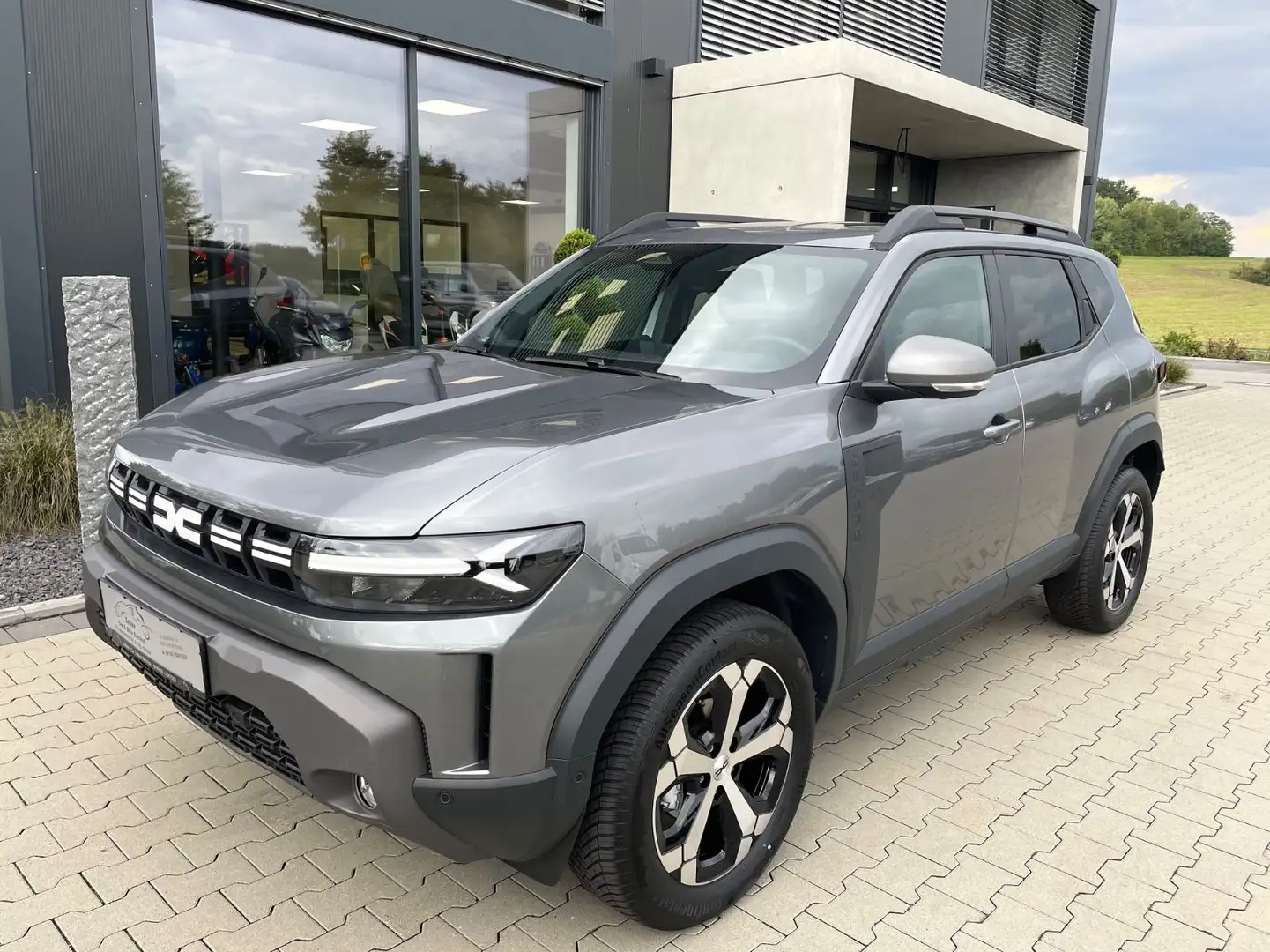 Dacia Duster TCe 130 4x4 Journey/Navi/Sitzhzg/Kamera Grau - 1