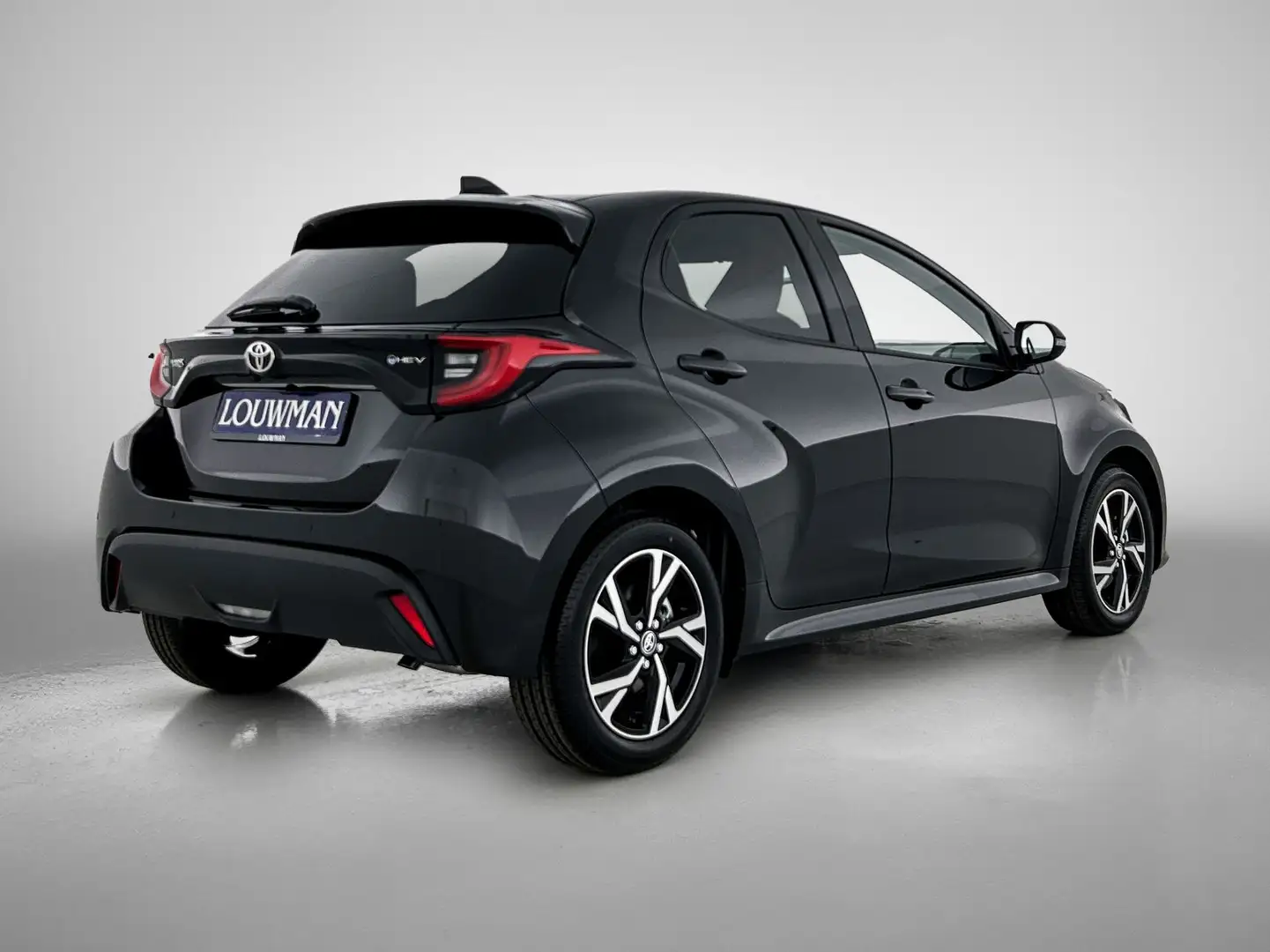 Toyota Yaris 1.5 Hybrid Dynamic Comfort Pakket - Louwman Zin in Zwart - 2