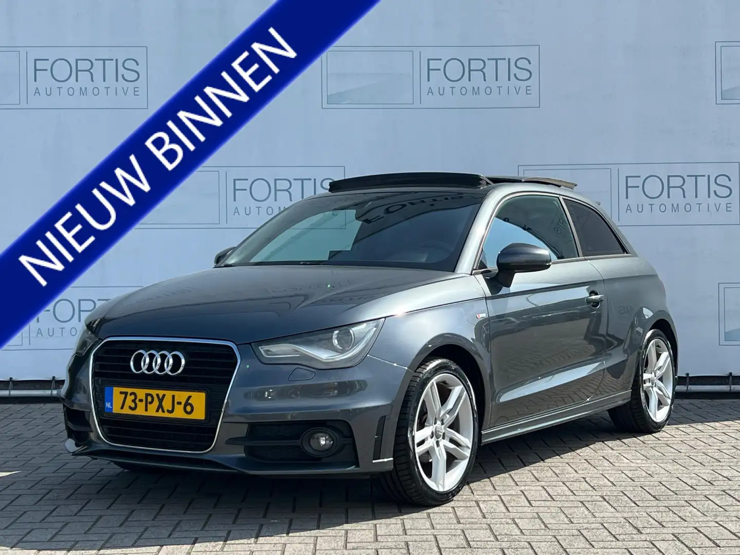 Audi A1 1.2 TFSI S edition NL AUTO | NAVI | PANO | AIRCO | Grijs - 1