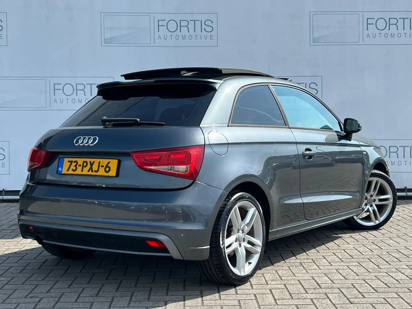 Audi A1 1.2 TFSI S edition NL AUTO | NAVI | PANO | AIRCO | Grijs - 2