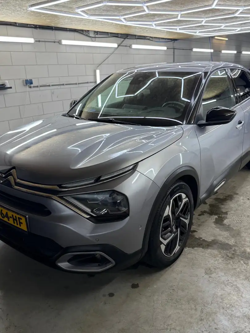 Citroen C4 1.2 PT. Shine Grijs - 1