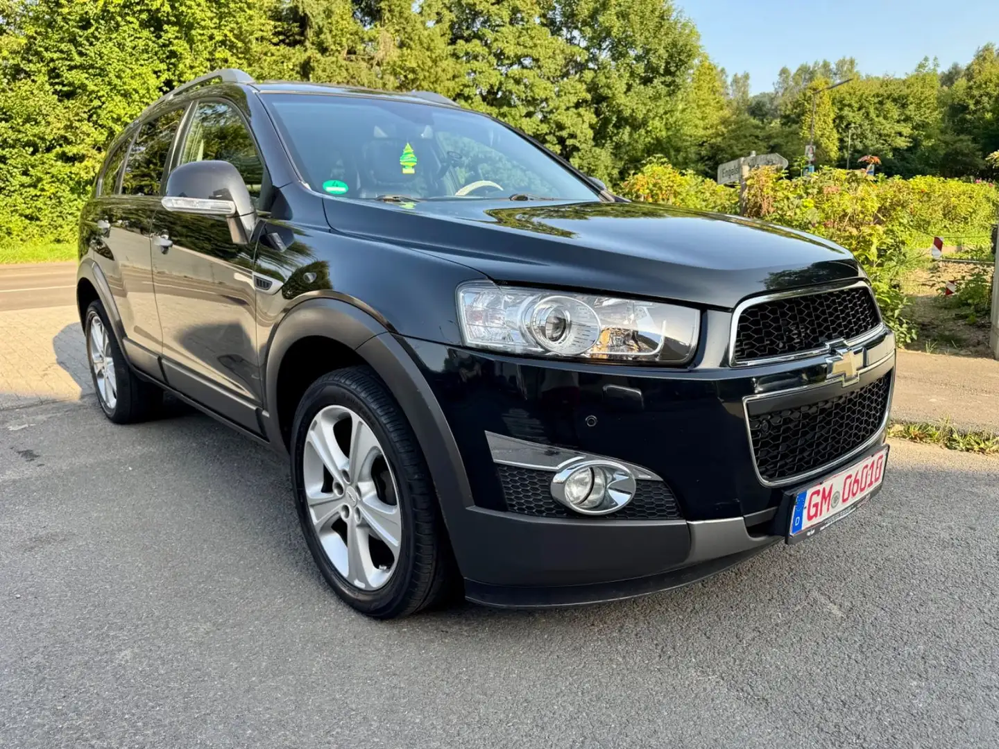 Chevrolet Captiva 2.2 D 4WD LederNaviSchiebedach7SitzTop Schwarz - 1