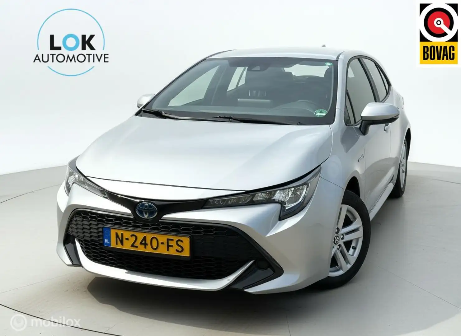 Toyota Corolla 1.8 Hybrid Business CAMERA|KEYLESS|NAP Grijs - 1