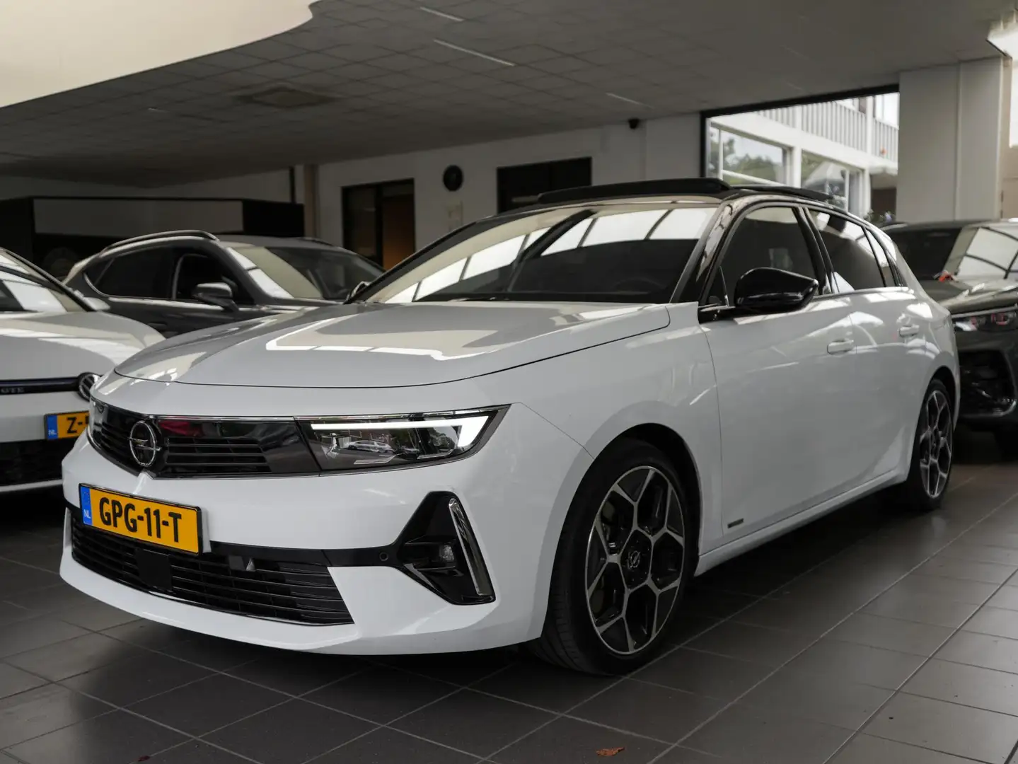 Opel Astra 1.6 Turbo Hybrid Ultimate | PANO | SFEER | 360° CA Wit - 1