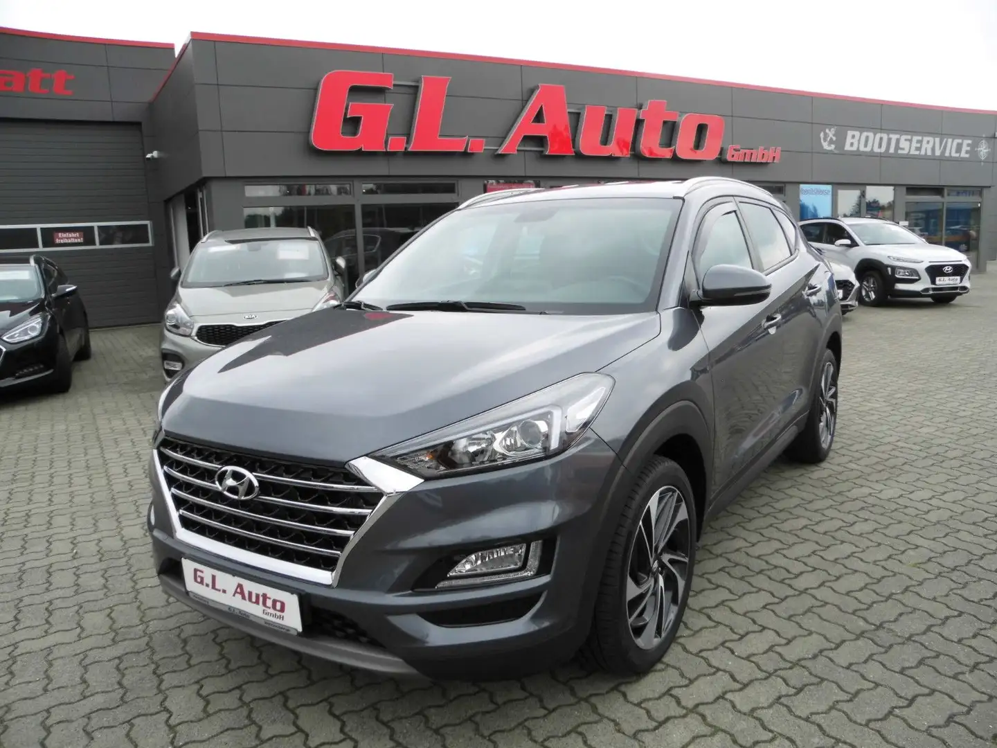 Hyundai TUCSON 1.6/Trend/DCT/19"/KAM/NAV/PDC/SH/TEMPO/SP Grau - 1